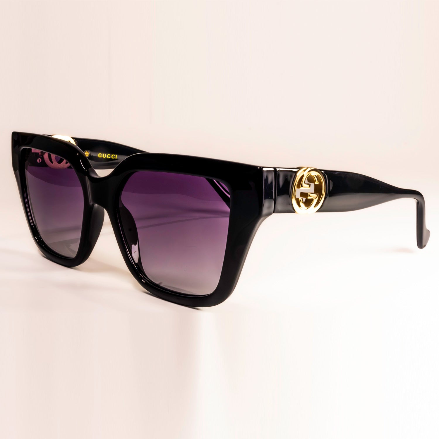 Gucci GG1023S Sunglasses featuring a full rim square frame made of acetate, showcasing a stylish and modern design.