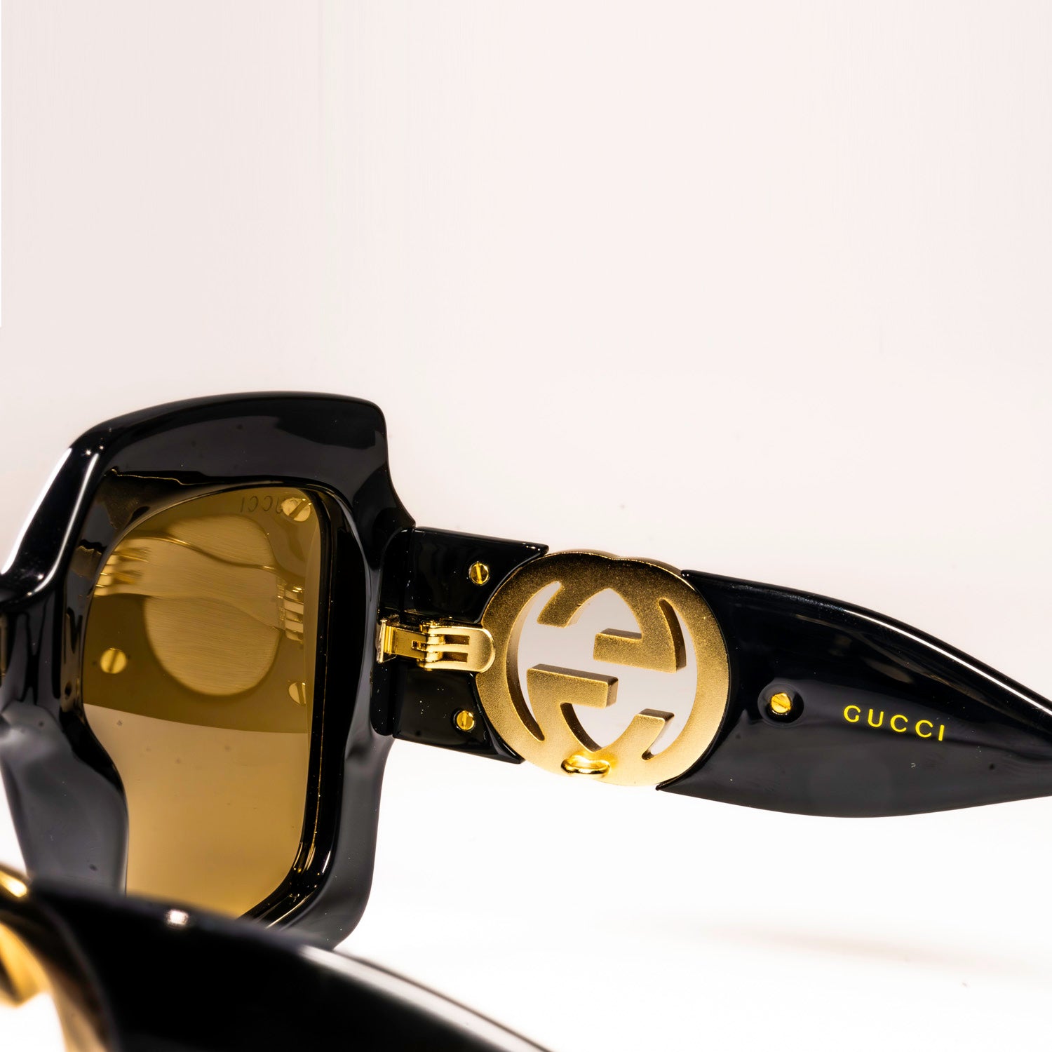 Gucci GG1022S Sunglasses featuring a full rim square frame made of acetate, showcasing a stylish design.