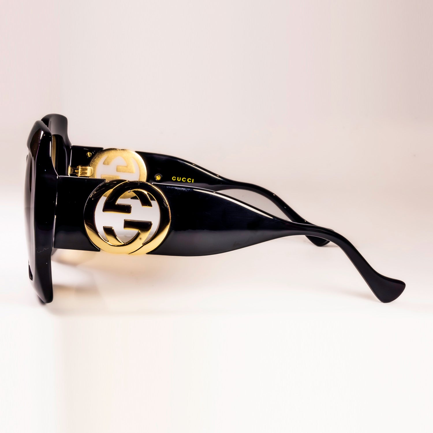 Gucci GG1022S Sunglasses featuring a full rim square frame made of acetate, showcasing a stylish design.