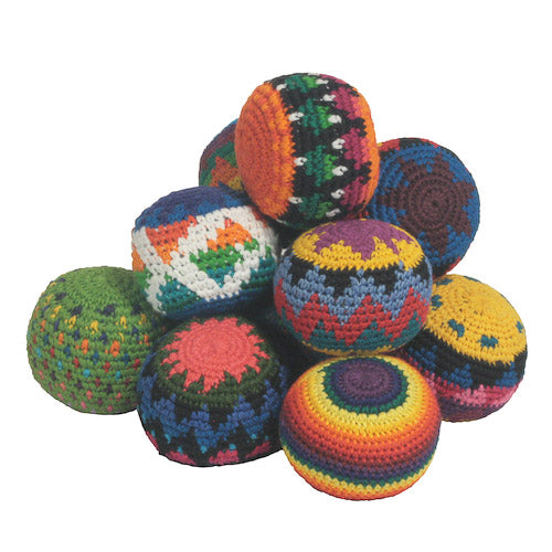 Colorful handmade hacky sack crafted by De Colores artisans in Guatemala, showcasing unique designs and vibrant colors.