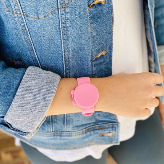 Colorful hand sanitizer bracelets made of soft silicone, adjustable for all sizes, featuring a refillable reservoir for easy access to sanitizer.