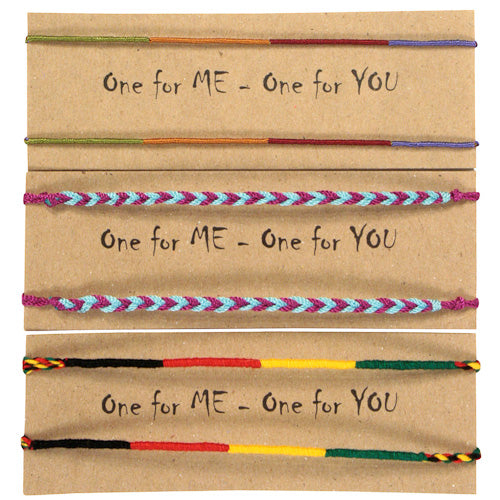 A pair of colorful hand-woven friendship bracelets showcasing intricate patterns and vibrant colors, symbolizing friendship and unity.