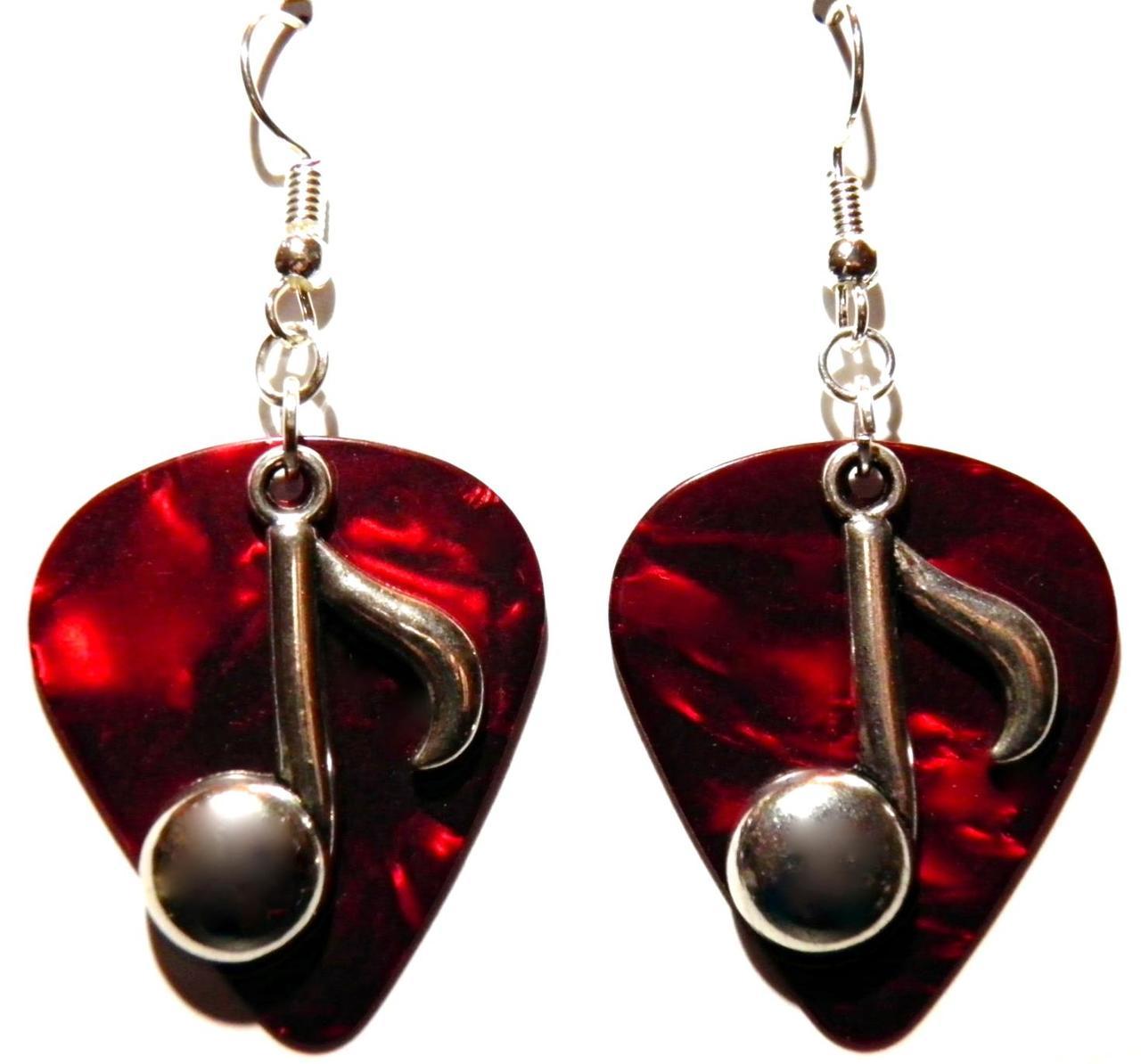 Colorful handmade guitar pick earrings with sterling silver hooks, showcasing a unique design perfect for music lovers.