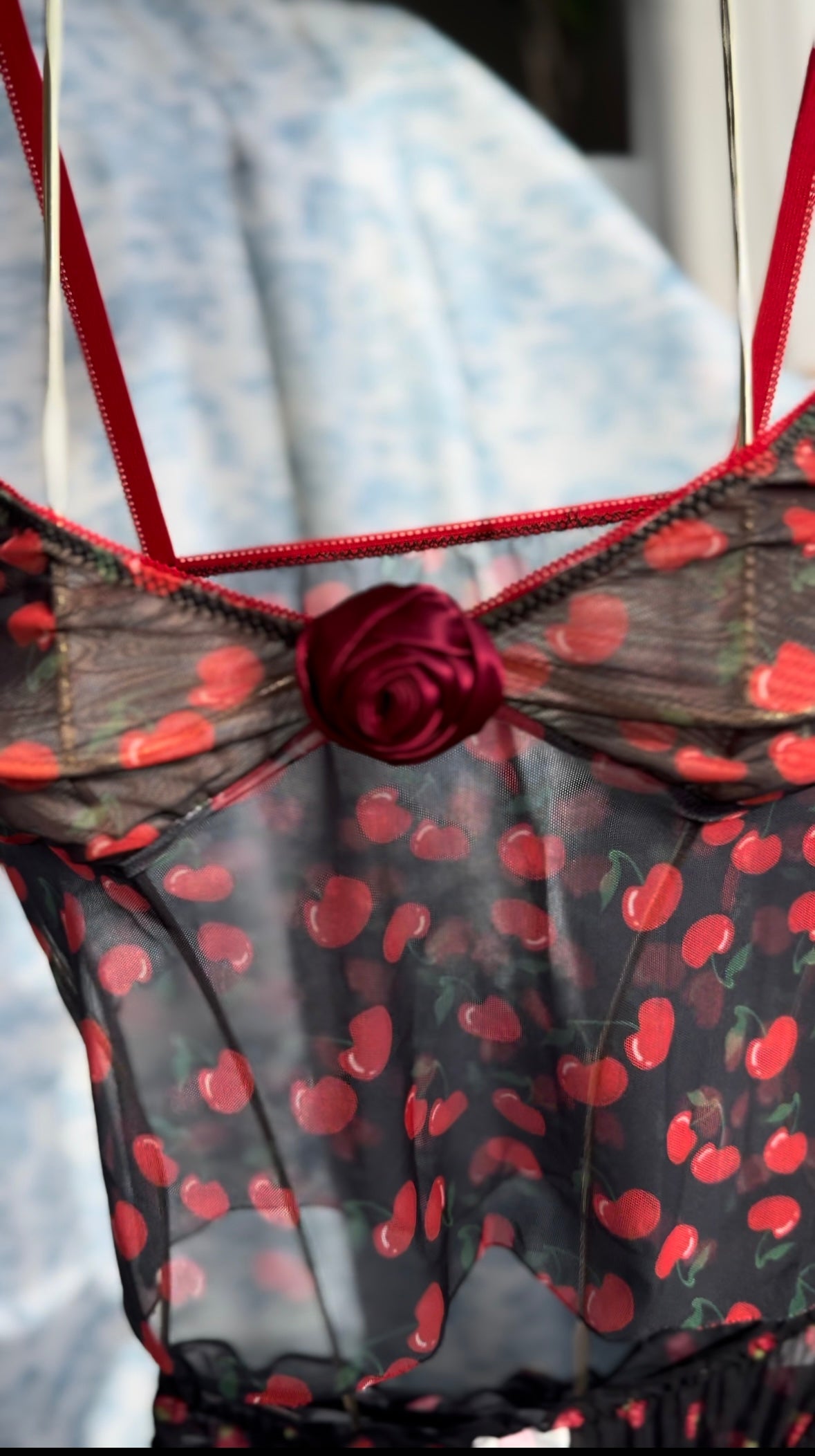 A stylish Handmade Mesh Black Cherry Rose Cami Top featuring intricate lacework and delicate cami straps, perfect for elegant layering.