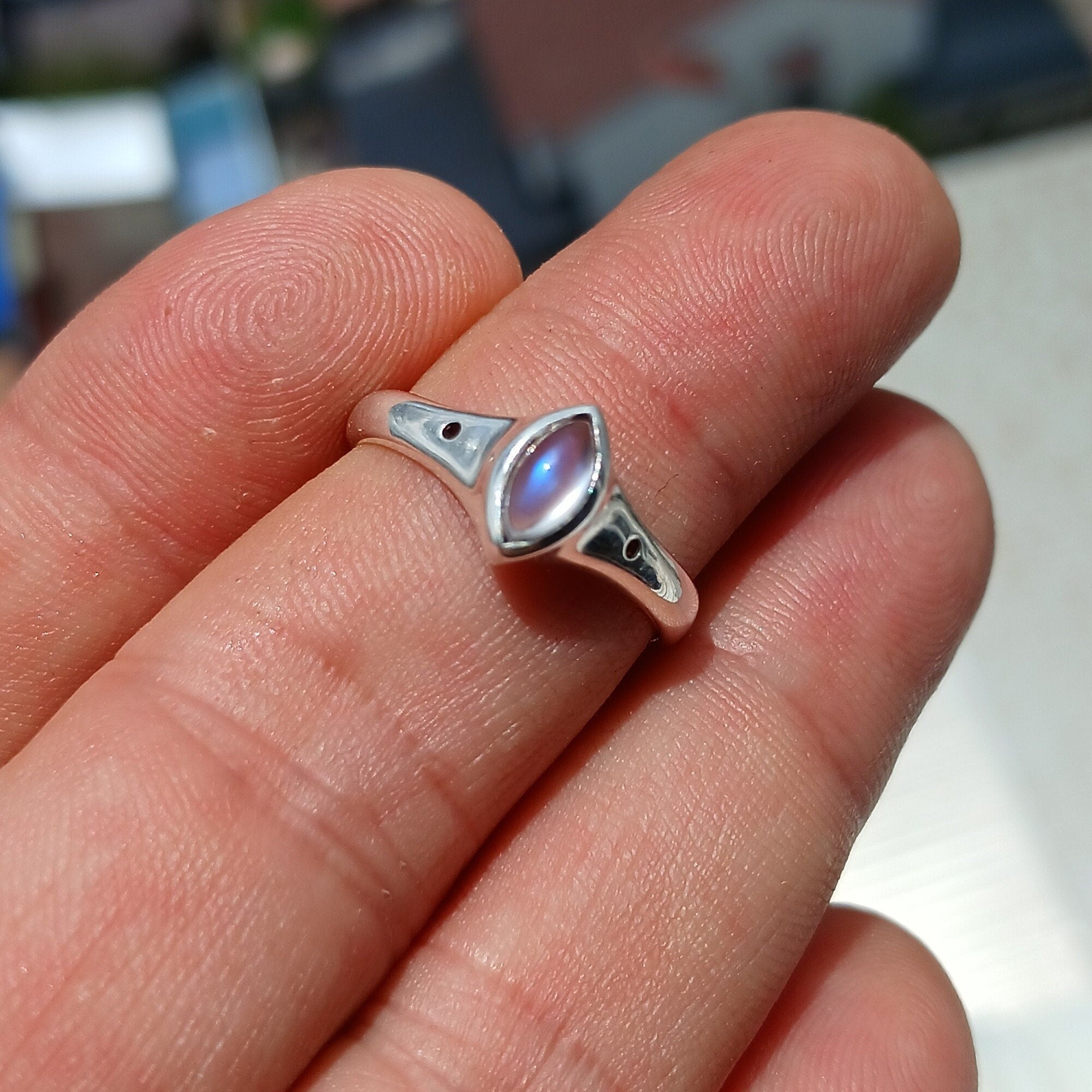 Handmade Moonstone Ring featuring a marquise-shaped Moonstone set in a polished Sterling Silver band, showcasing elegance and craftsmanship.