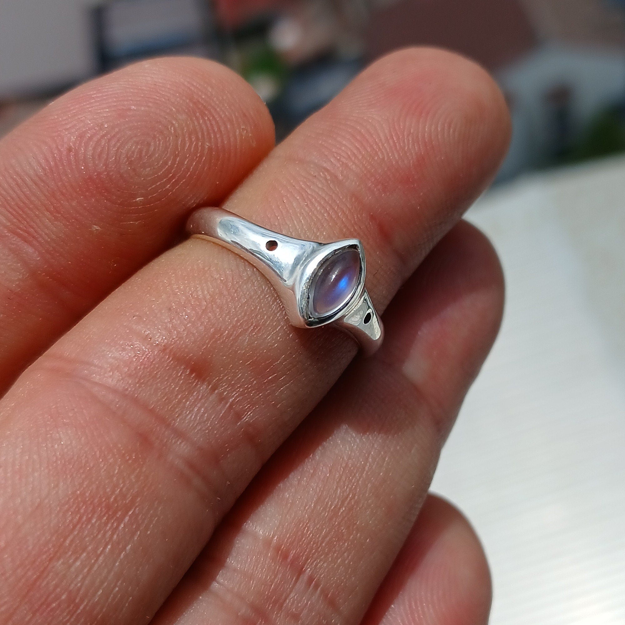 Handmade Moonstone Ring featuring a marquise-shaped Moonstone set in a polished Sterling Silver band, showcasing elegance and craftsmanship.