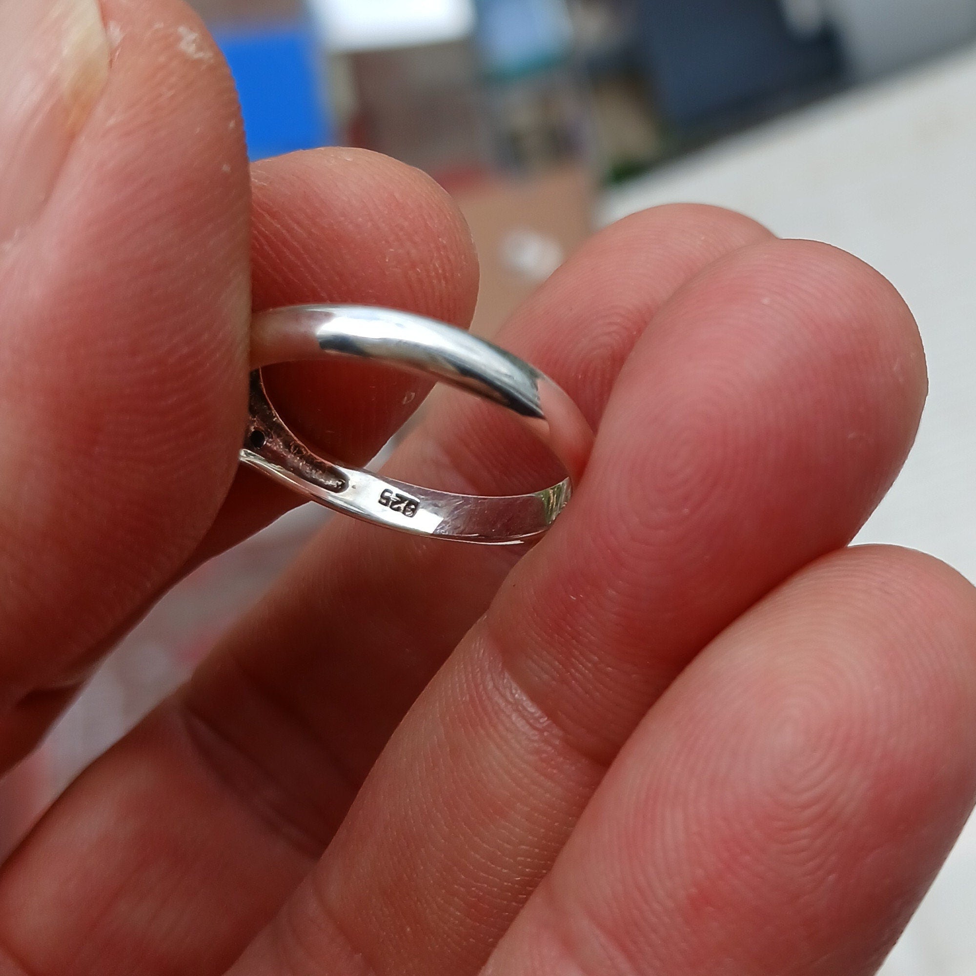 Handmade Moonstone Ring featuring a marquise-shaped Moonstone set in a polished Sterling Silver band, showcasing elegance and craftsmanship.