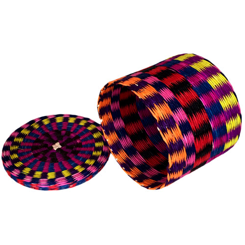 Handwoven Round Box made from Toquilla fiber, featuring a colorful rainbow design, perfect for storage or decoration.