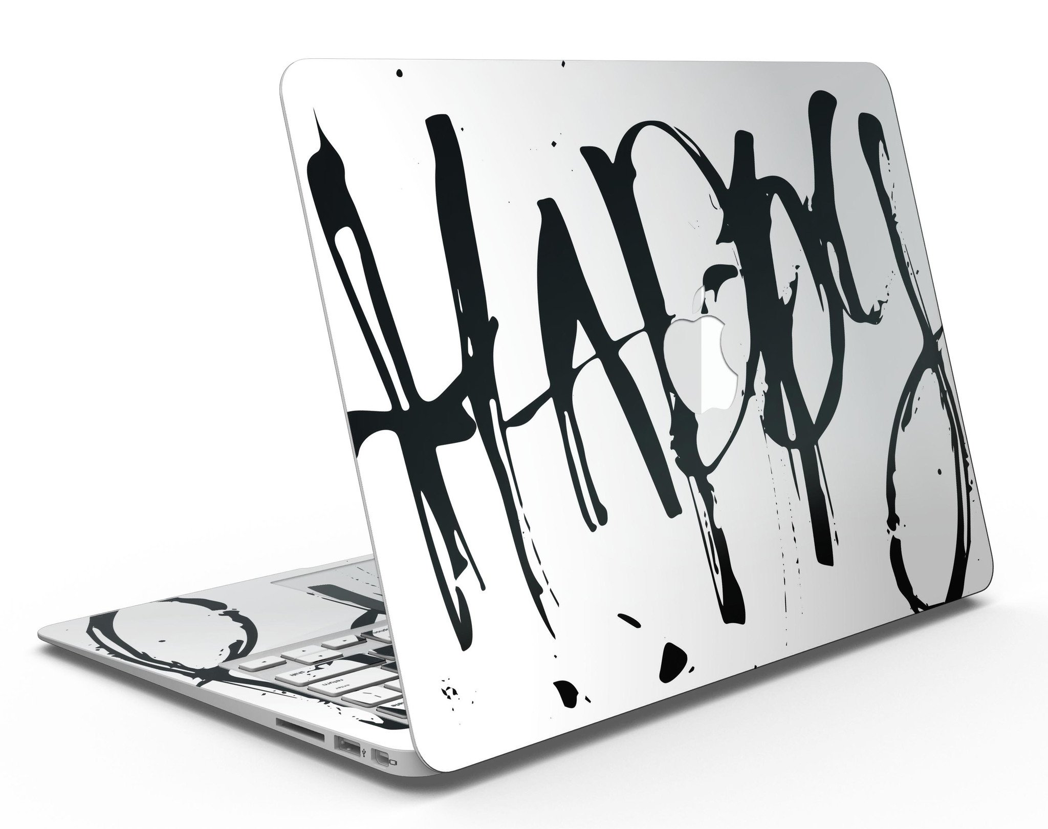 Happy Splatter MacBook Air Skin Kit showcasing vibrant design and premium vinyl material.