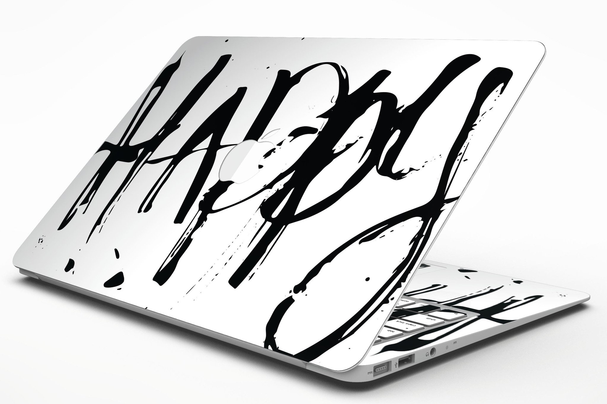 Happy Splatter MacBook Air Skin Kit showcasing vibrant design and premium vinyl material.