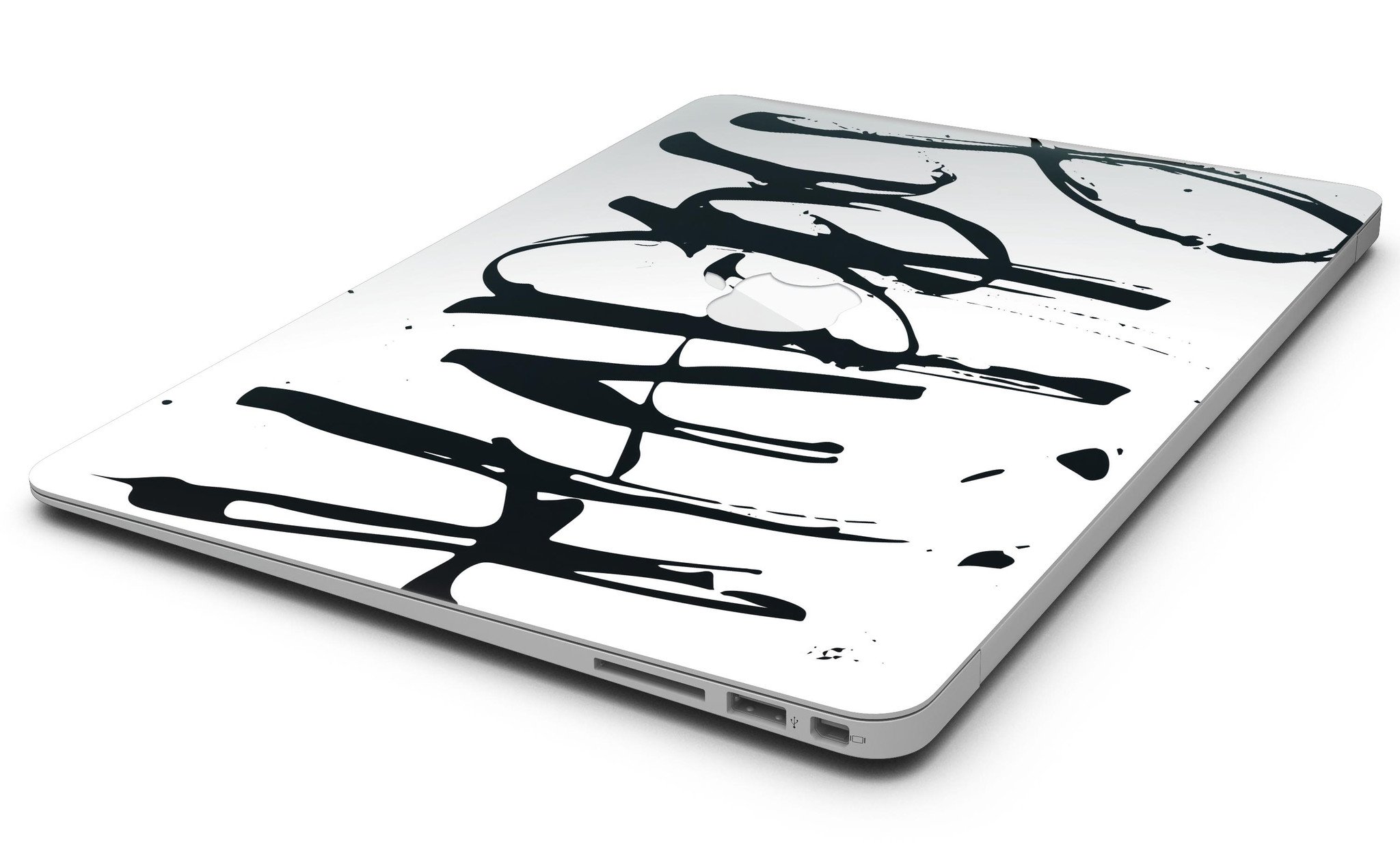 Happy Splatter MacBook Air Skin Kit showcasing vibrant design and premium vinyl material.