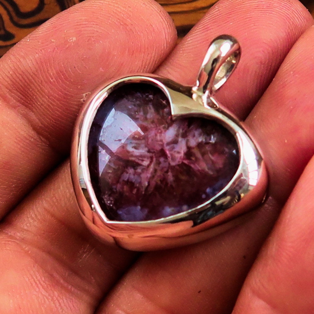 Sterling Silver Heart Pendant featuring a purple Druzy Agate cabochon, elegantly designed for love and beauty.