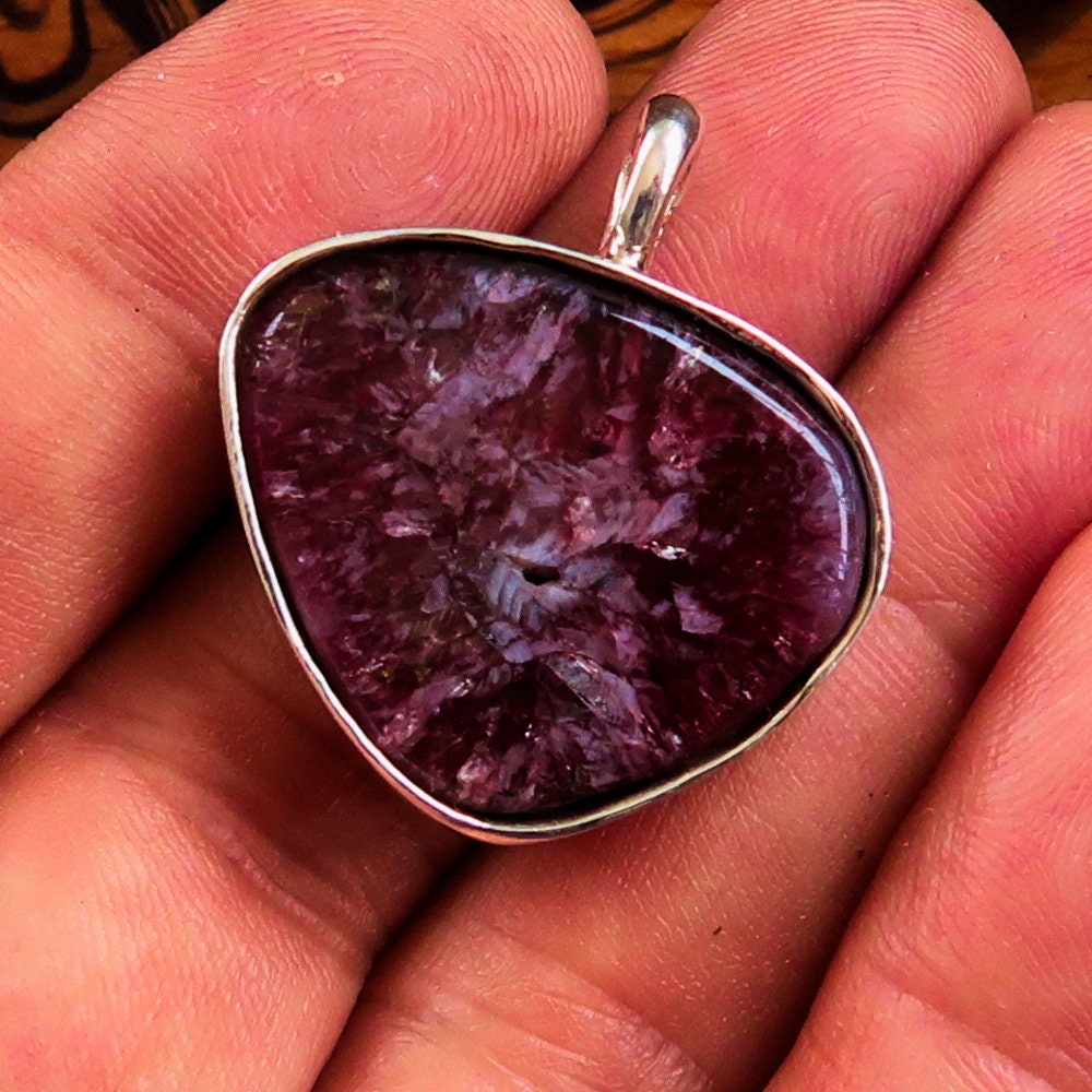 Sterling Silver Heart Pendant featuring a purple Druzy Agate cabochon, elegantly designed for love and beauty.