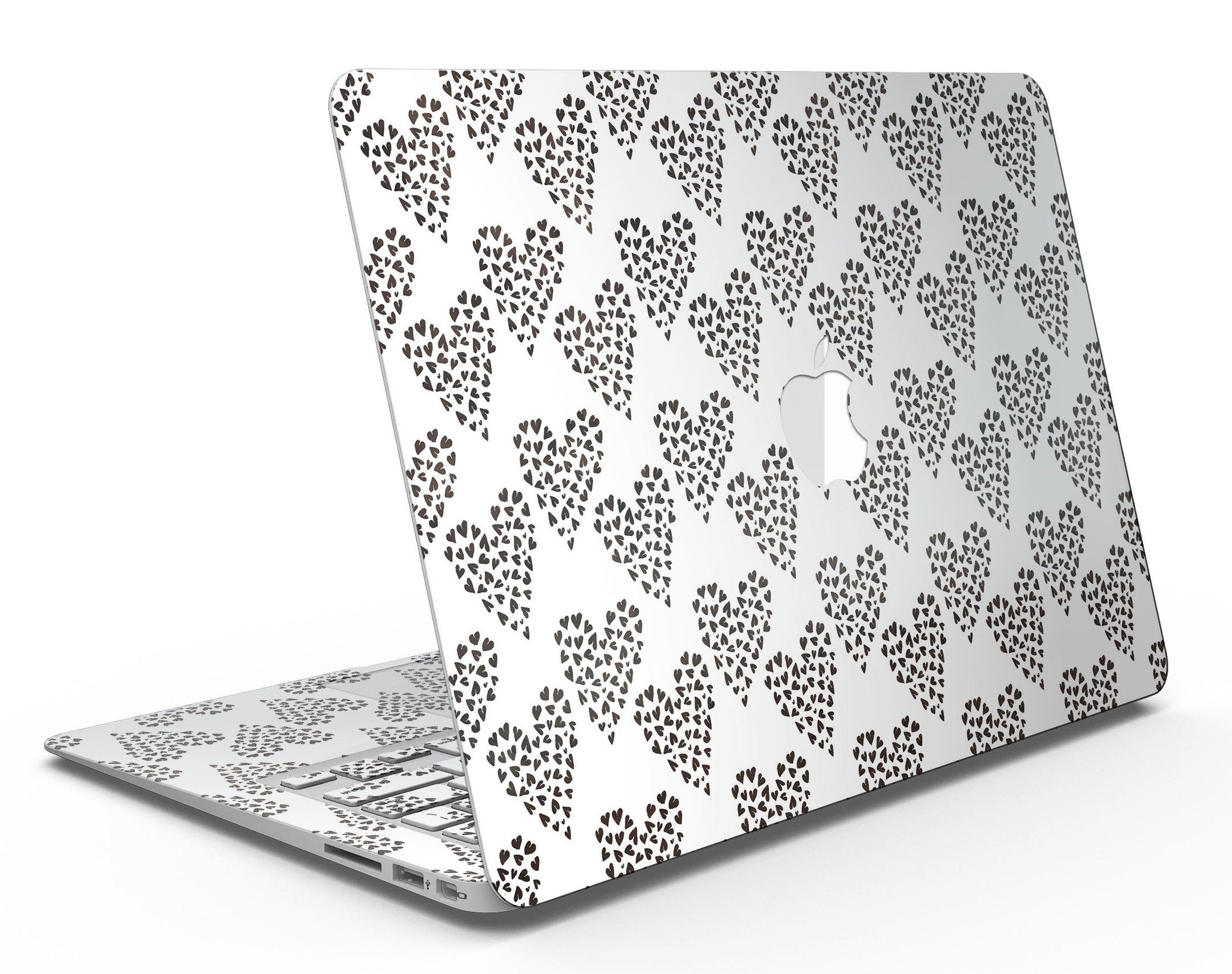 Hearts within Hearts MacBook Air Skin Kit showcasing vibrant heart patterns on a sleek laptop surface.