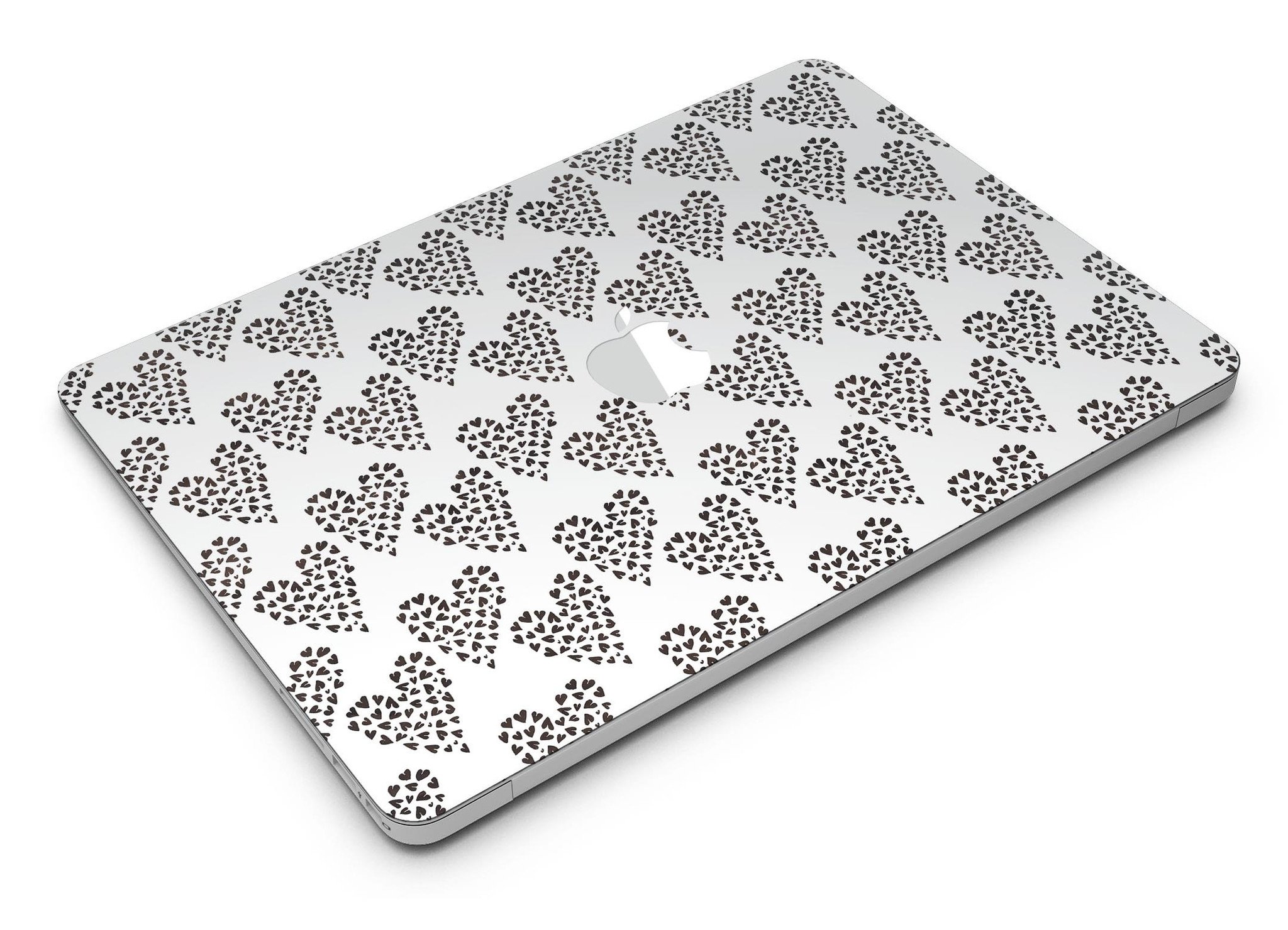 Hearts within Hearts MacBook Air Skin Kit showcasing vibrant heart patterns on a sleek laptop surface.