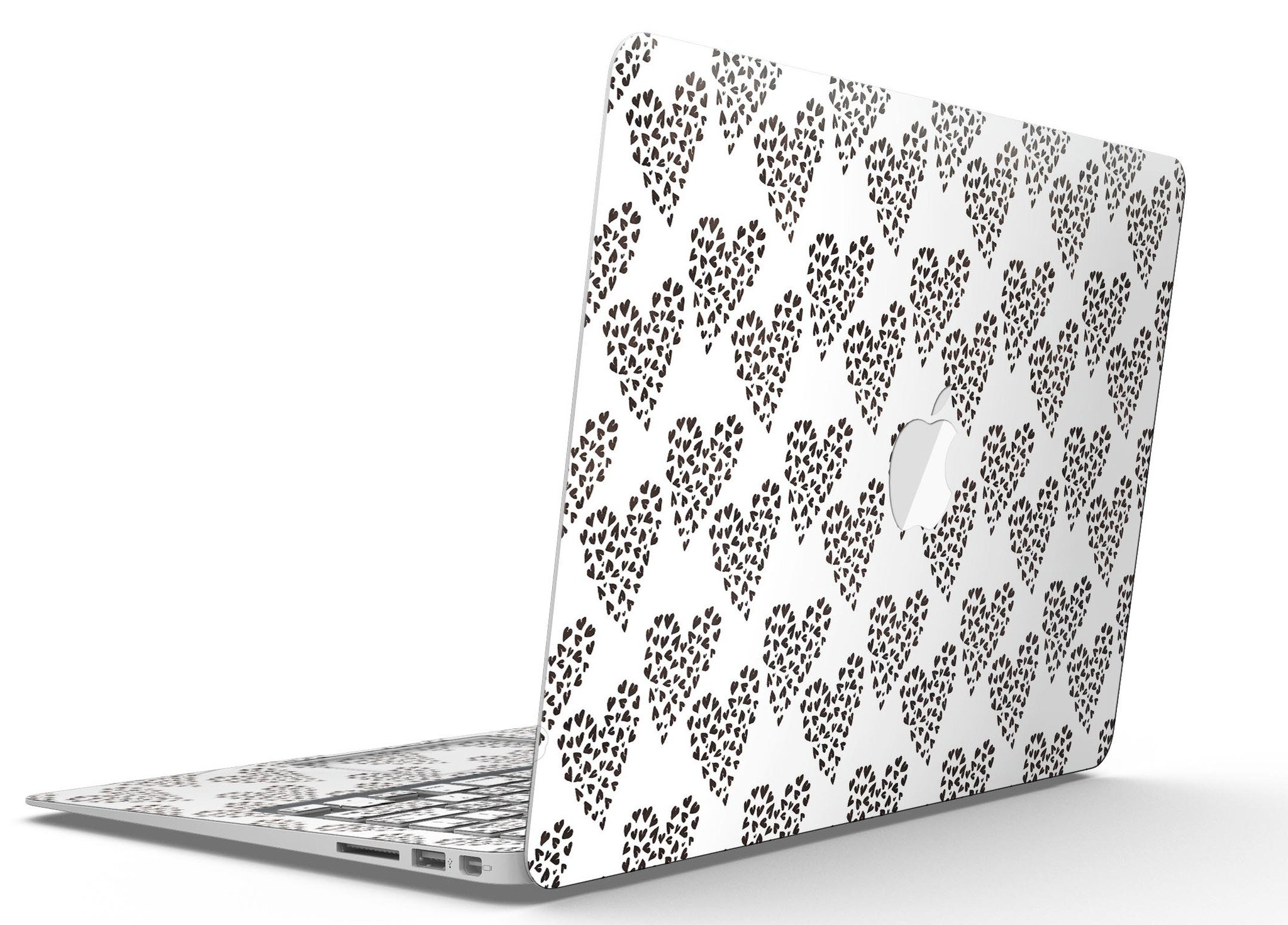 Hearts within Hearts MacBook Air Skin Kit showcasing vibrant heart patterns on a sleek laptop surface.