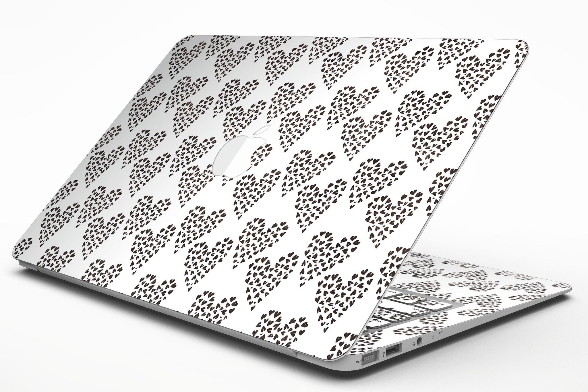 Hearts within Hearts MacBook Air Skin Kit showcasing vibrant heart patterns on a sleek laptop surface.