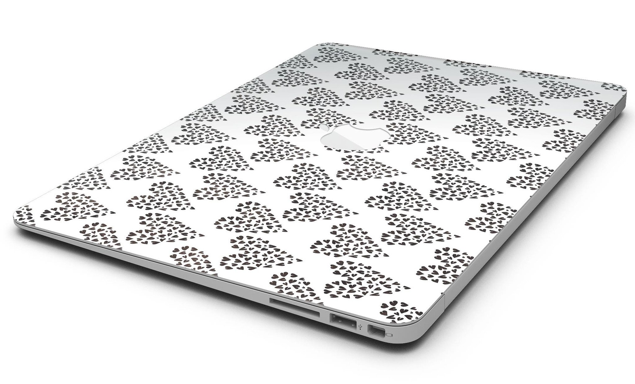 Hearts within Hearts MacBook Air Skin Kit showcasing vibrant heart patterns on a sleek laptop surface.