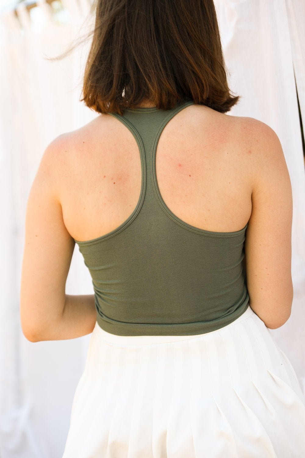 High Neck Racerback Brami in a stylish design, showcasing its soft fabric and racerback style, perfect for summer wear.