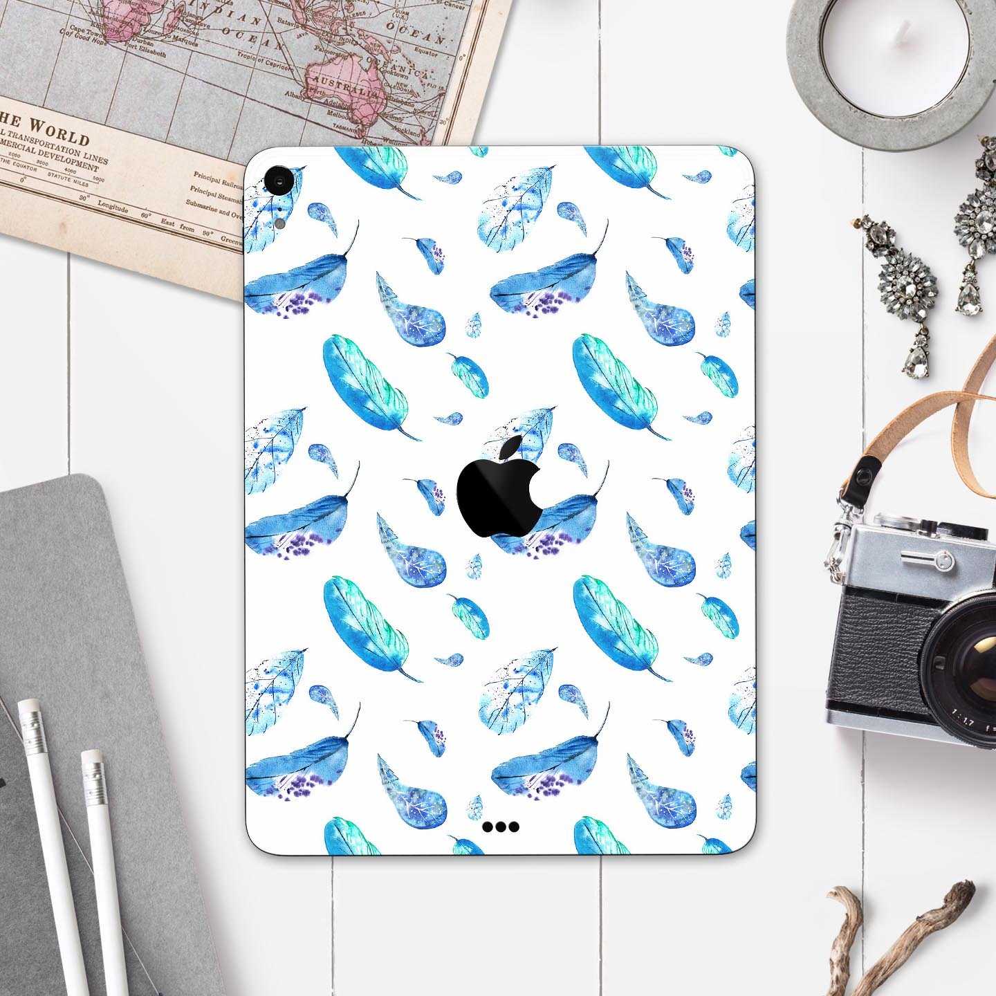 Hipster Feather Pattern Full Body Skin Decal for Apple iPad Pro, showcasing vibrant feather design on a sleek surface.