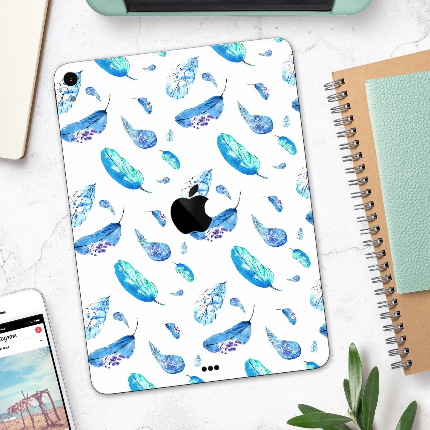 Hipster Feather Pattern Full Body Skin Decal for Apple iPad Pro, showcasing vibrant feather design on a sleek surface.