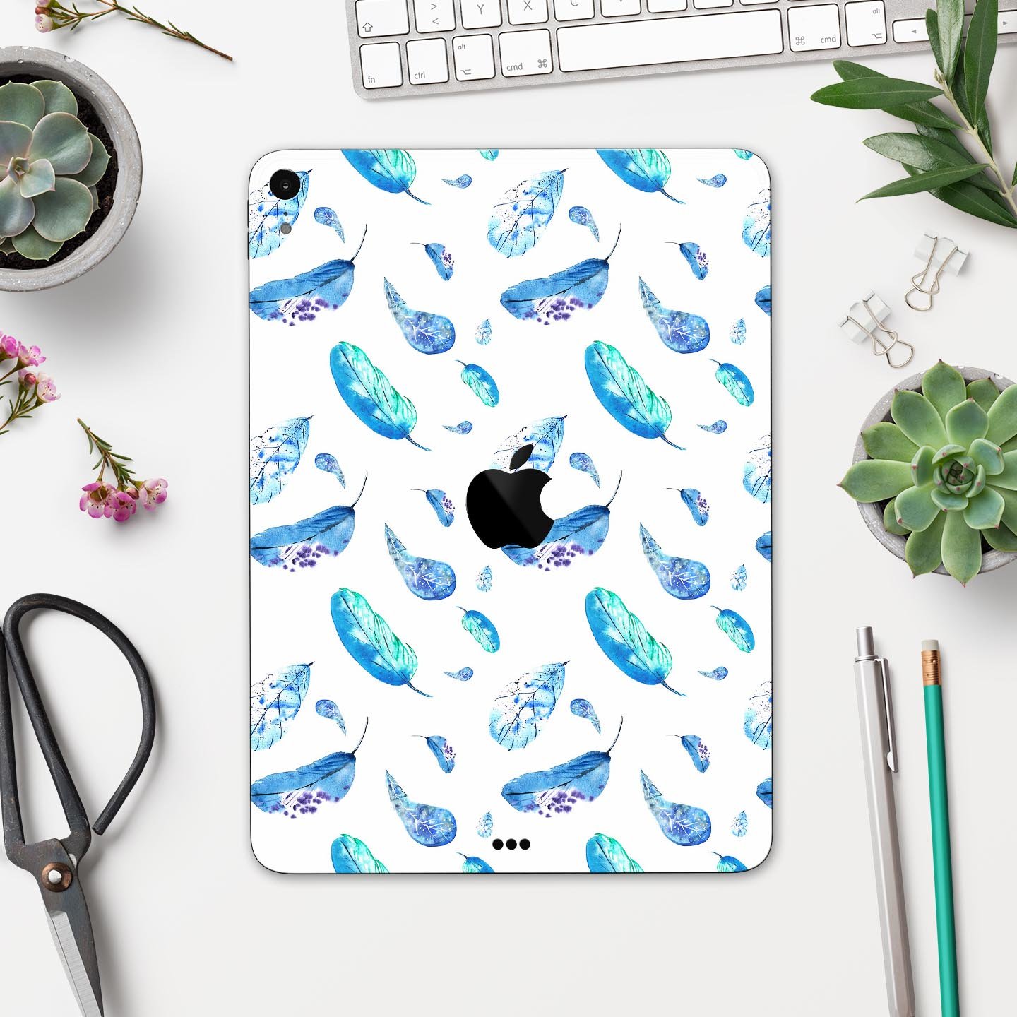 Hipster Feather Pattern Full Body Skin Decal for Apple iPad Pro, showcasing vibrant feather design on a sleek surface.