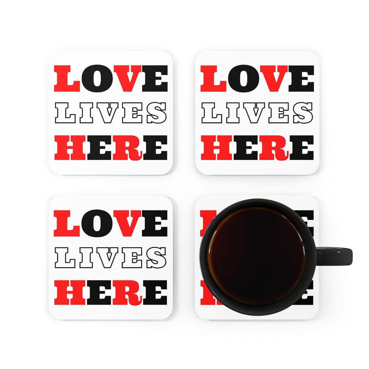 A stylish 4-piece coaster set featuring a high-gloss finish and cork backing, with the phrase 'Love Lives Here' elegantly displayed.