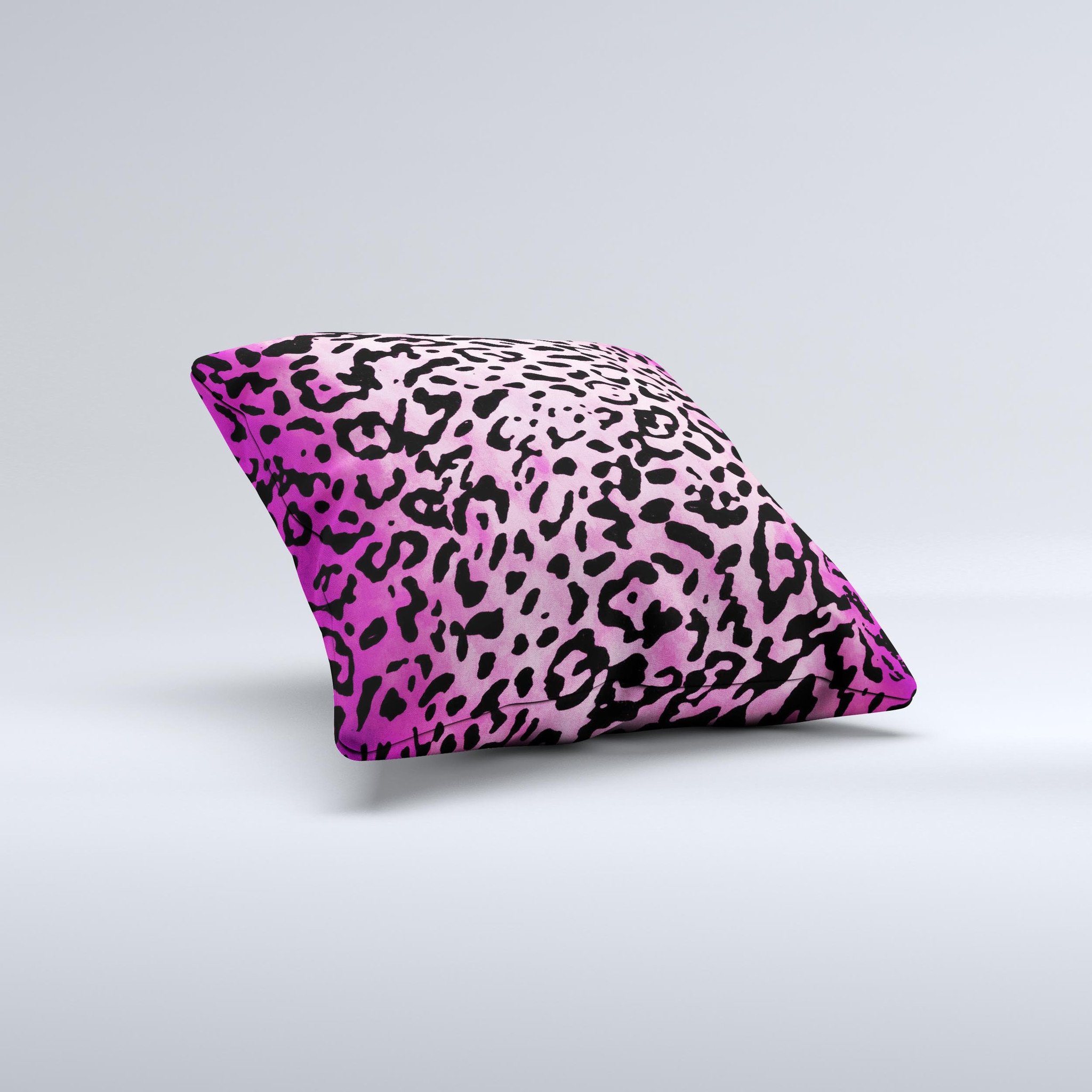 Hot pink cheetah print decorative throw pillow with a soft texture, handcrafted in Virginia, showcasing unique ink-fuzed graphics.