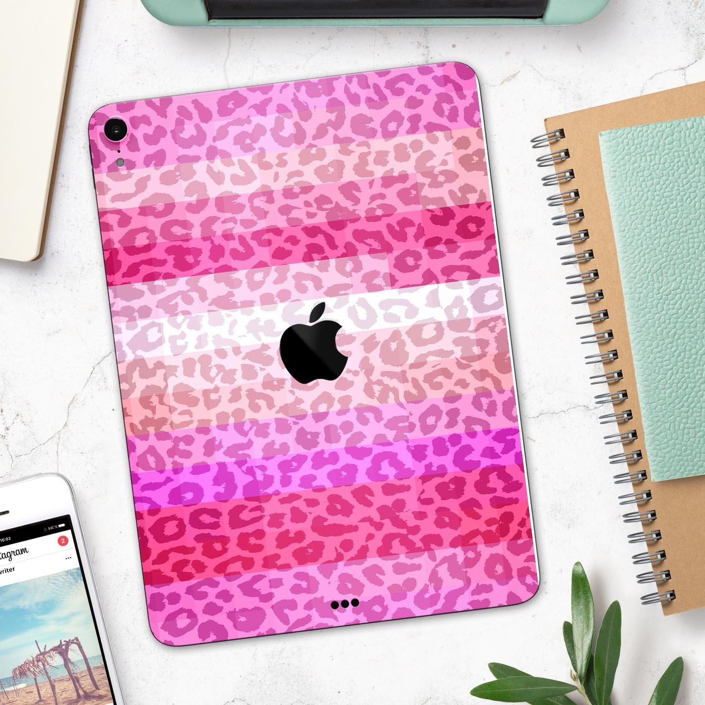 iPad with pink leopard print case