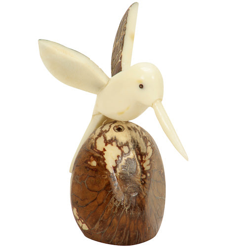 Handcrafted Humming Bird figurine with brown wings made from tagua nut, showcasing intricate details and natural beauty.