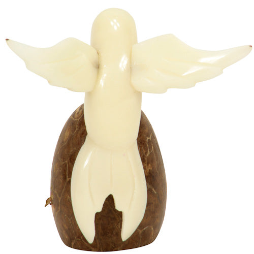 Handcrafted Humming Bird figurine made from tagua nut, showcasing natural wings and intricate details, symbolizing eco-friendly artistry.