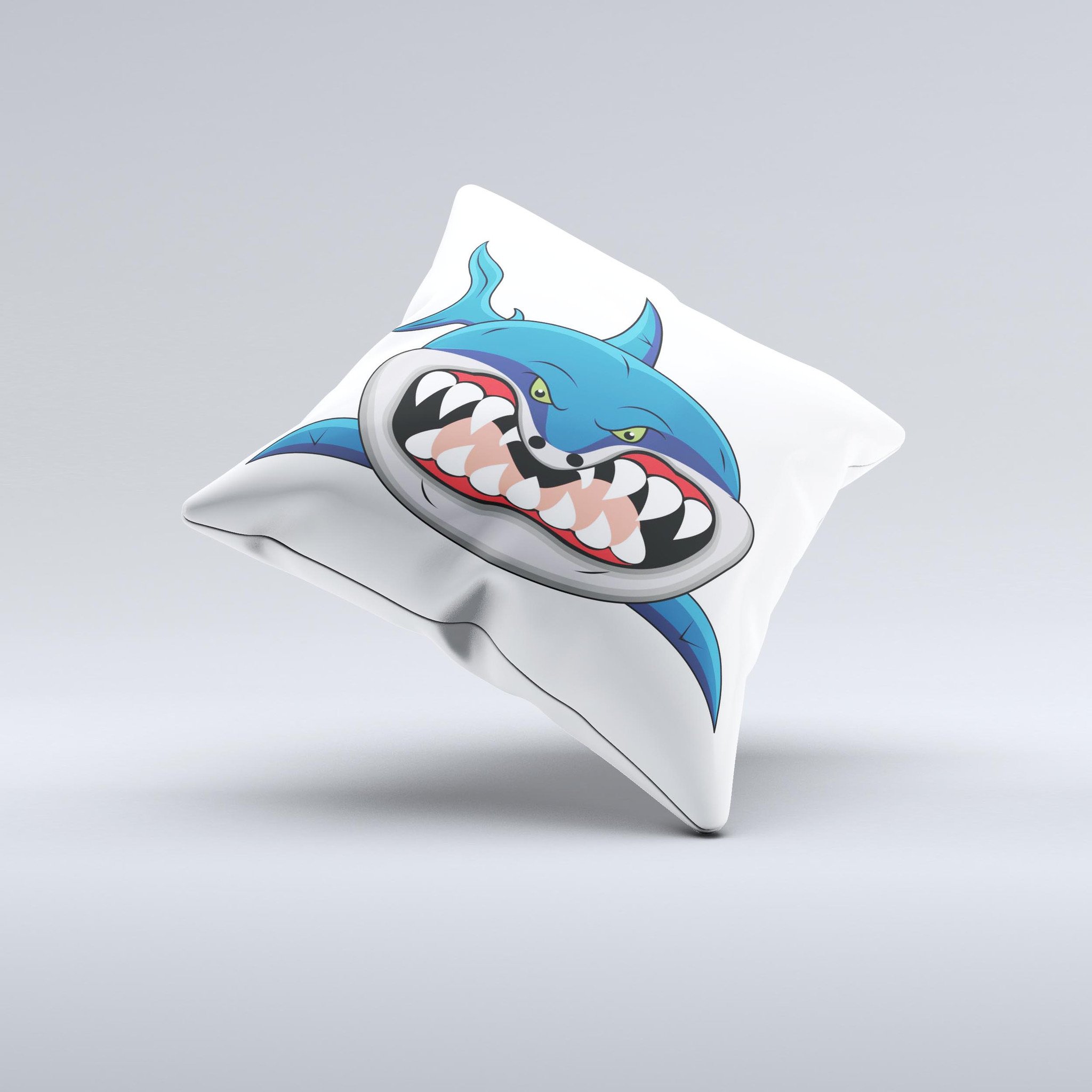 A decorative throw pillow featuring a whimsical cartoon shark design, showcasing vibrant colors and a soft fabric texture, perfect for home decor.