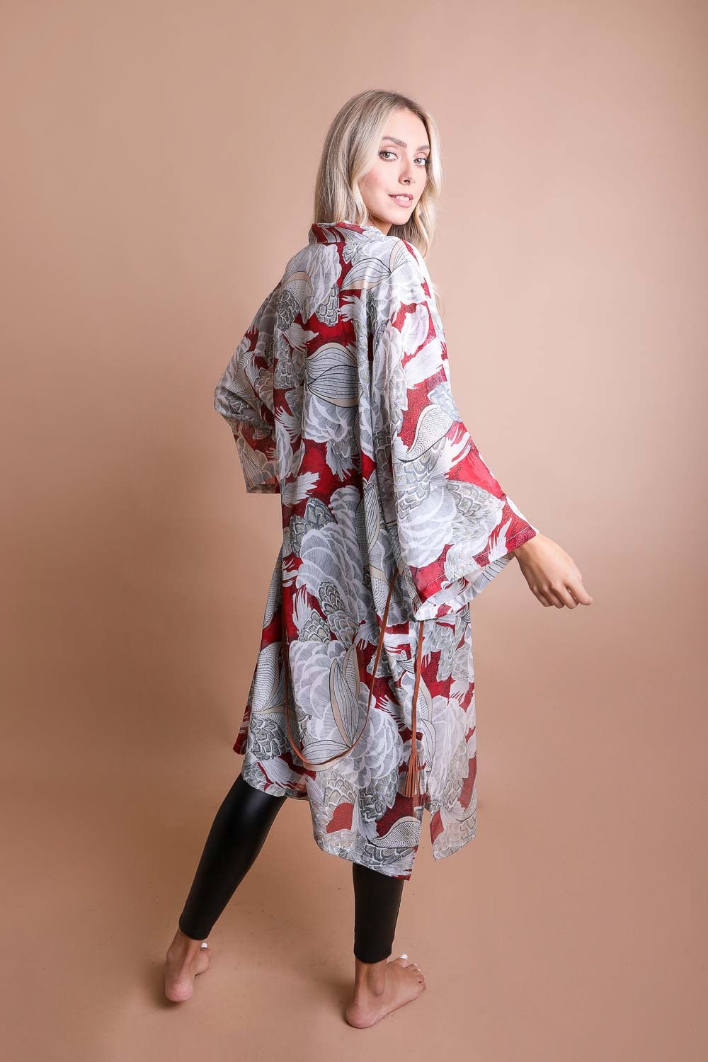 Ikebana Kimono featuring a traditional print with a modern twist, complete with a suede waist tie belt.