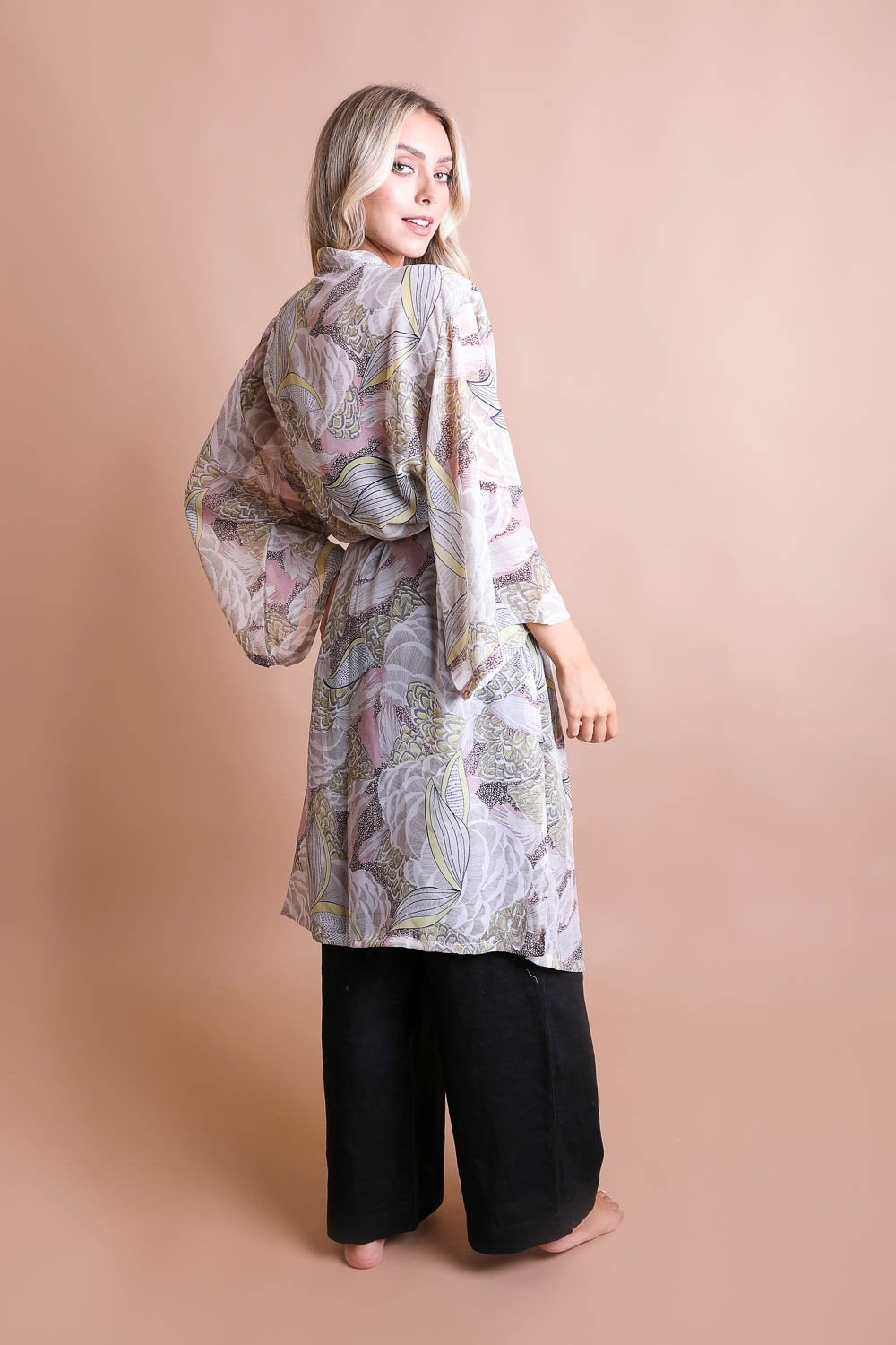 Ikebana Kimono featuring a traditional print with a modern twist, complete with a suede waist tie belt.