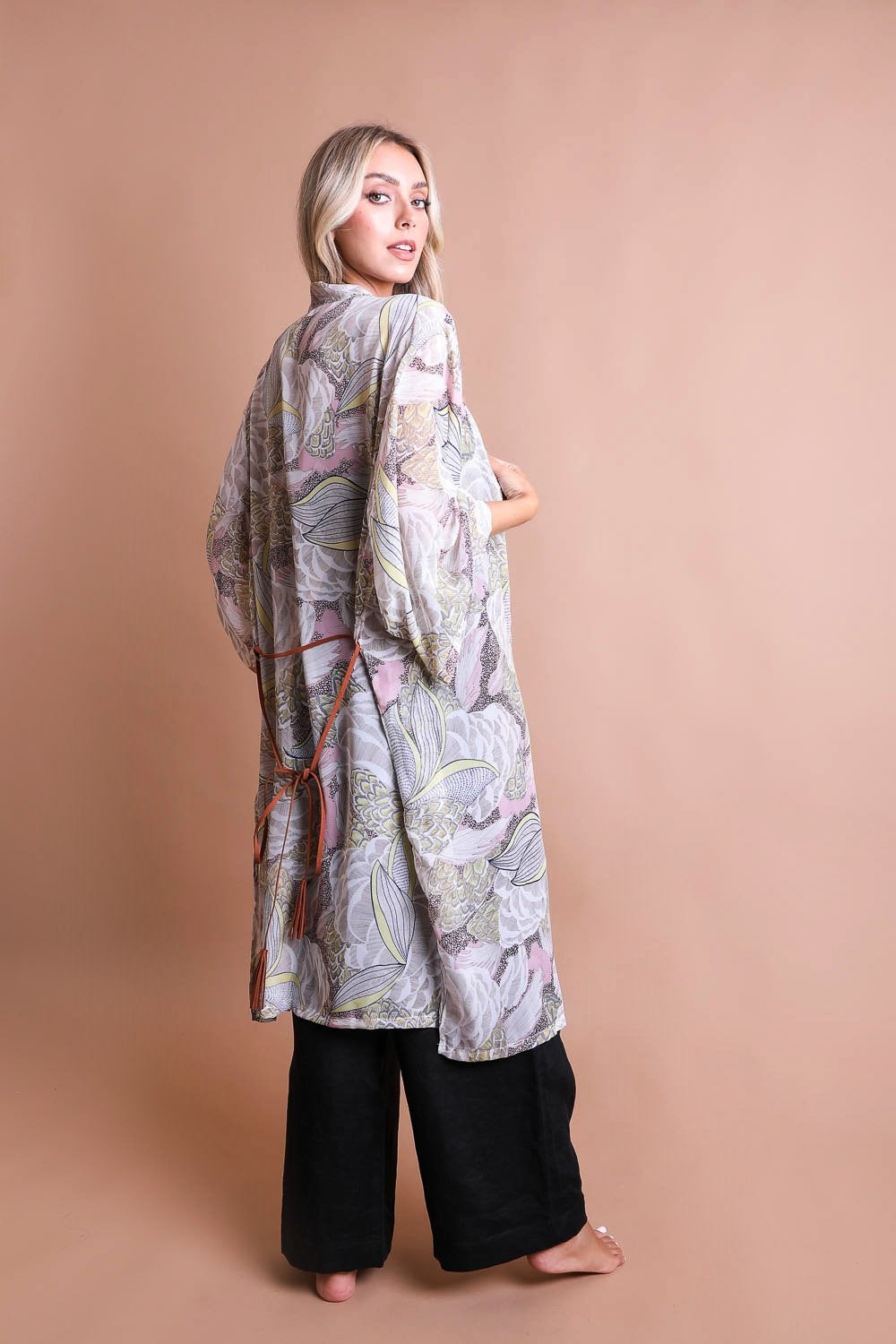 Ikebana Kimono featuring a traditional print with a modern twist, complete with a suede waist tie belt.