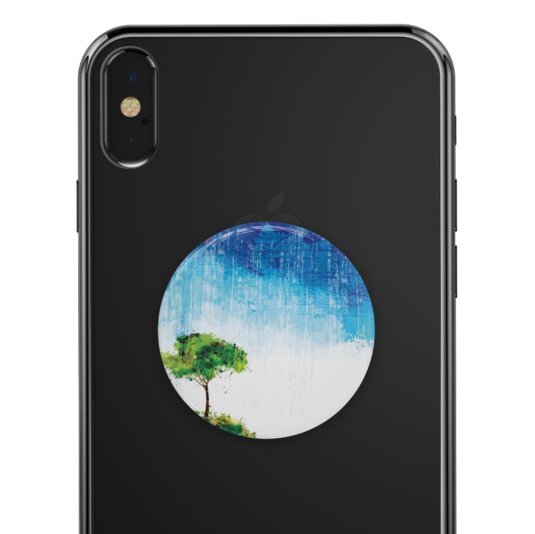 Individual Tree Splatter Skin Kit for PopSockets, showcasing vibrant colors and unique design on a smartphone grip.