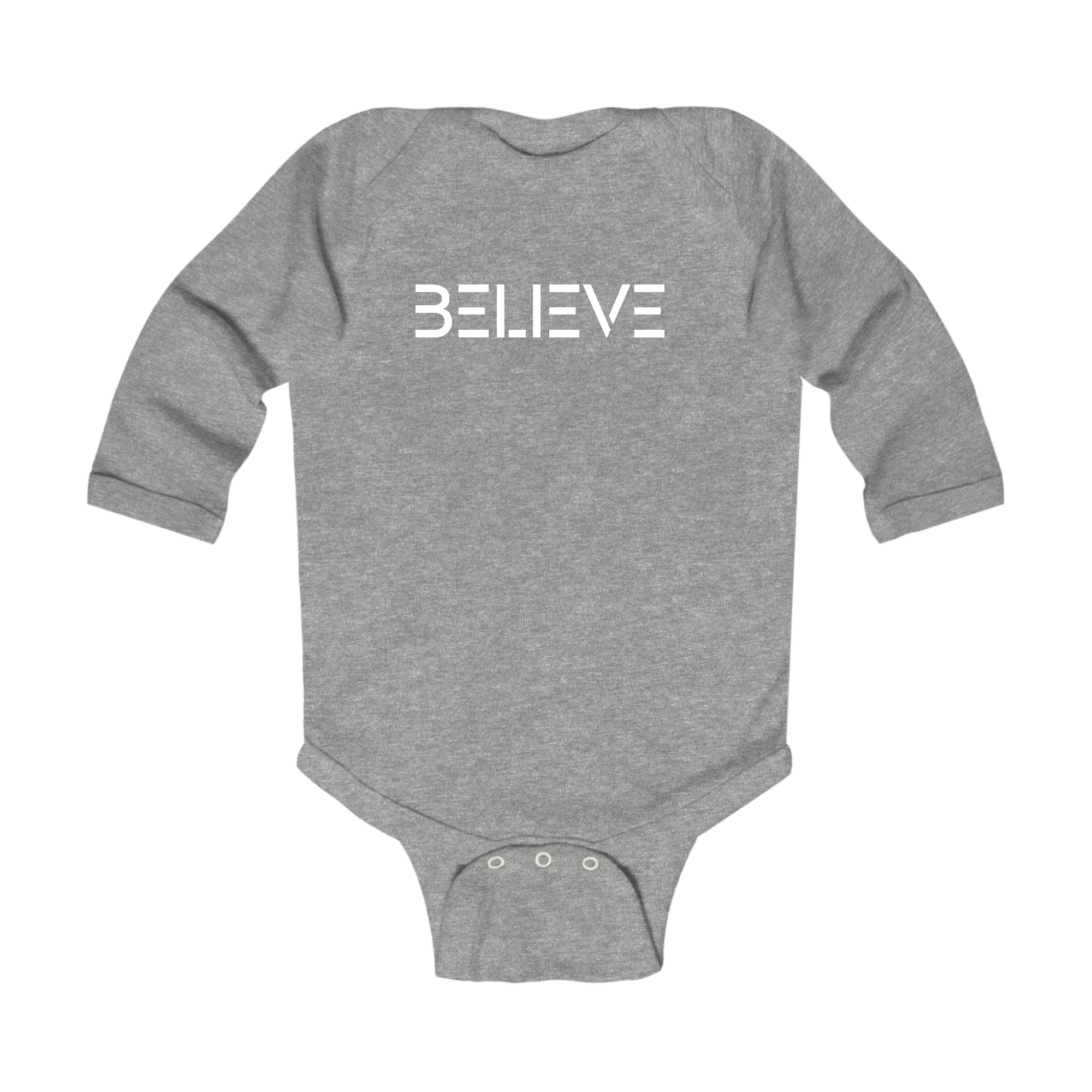 Infant Long Sleeve Graphic T-shirt in white with Believe print, featuring lap shoulders and three snap closure for easy dressing.