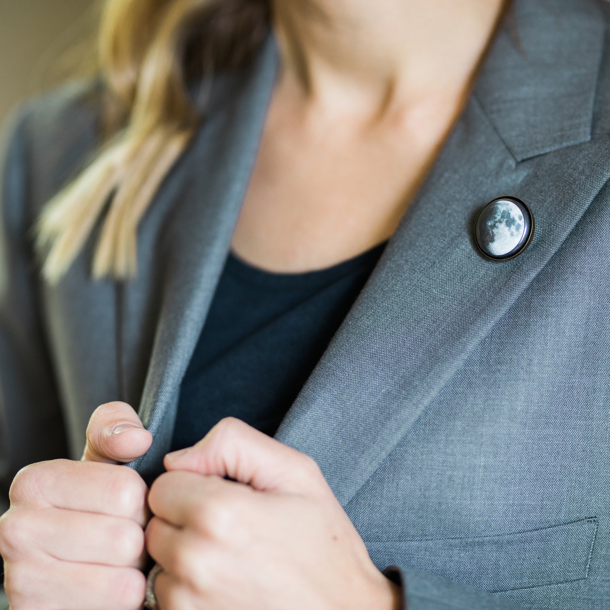 Interchangeable Moon Phase Lapel Pin set showcasing five lunar phases in silver and bronze tones, perfect for blazers and decorative displays.