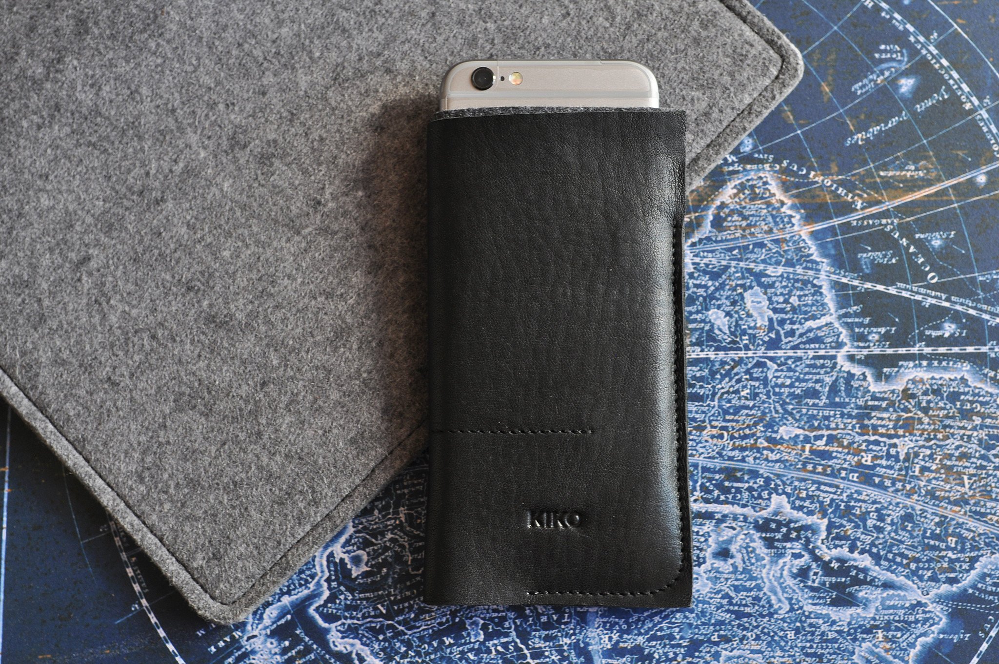 Stylish iPhone Wrap made from American Horween Leather and wool felt, featuring heat burnished details and slots for cash and cards.