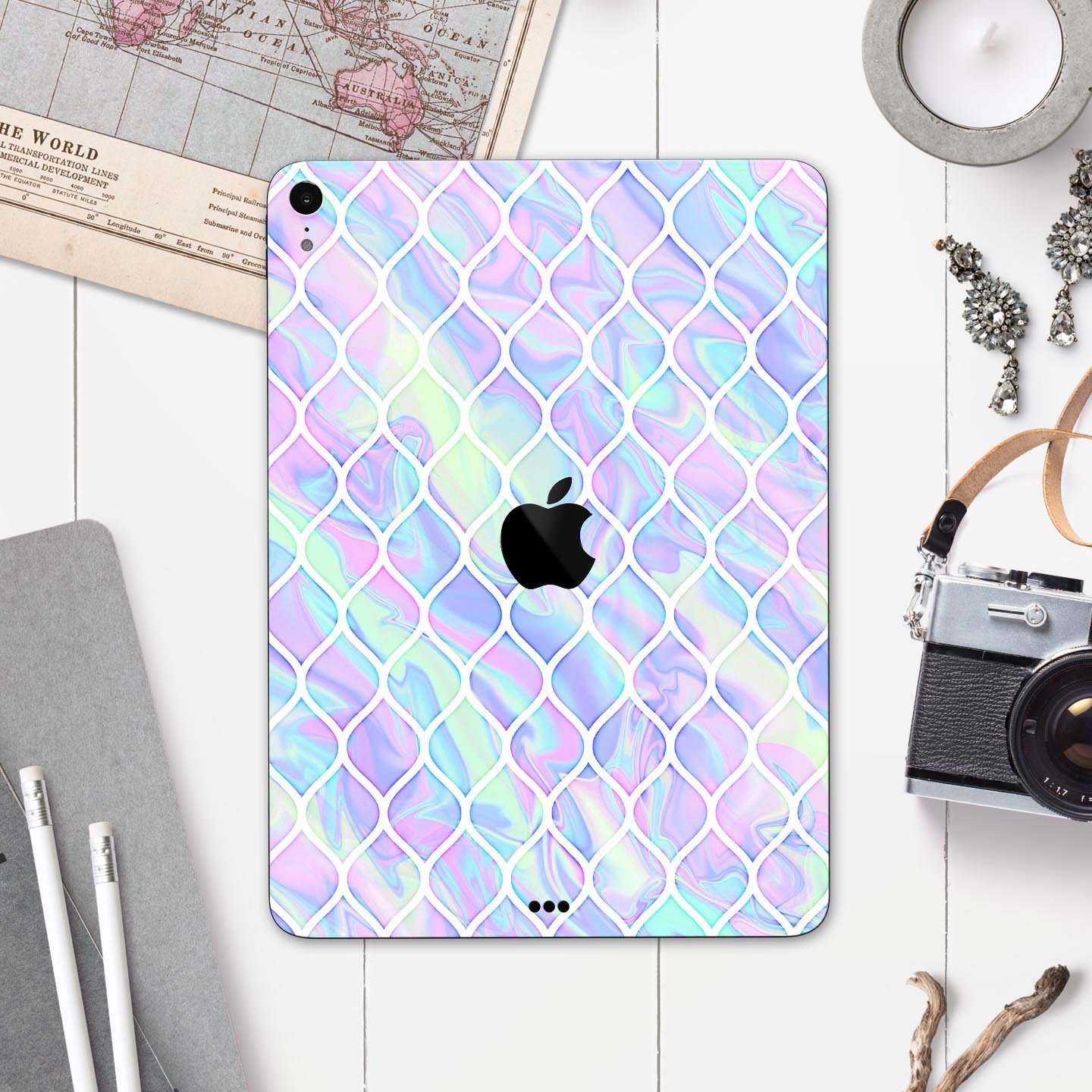 Iridescent Dahlia v4 skin decal for Apple iPad Pro, showcasing vibrant colors and a sleek design.