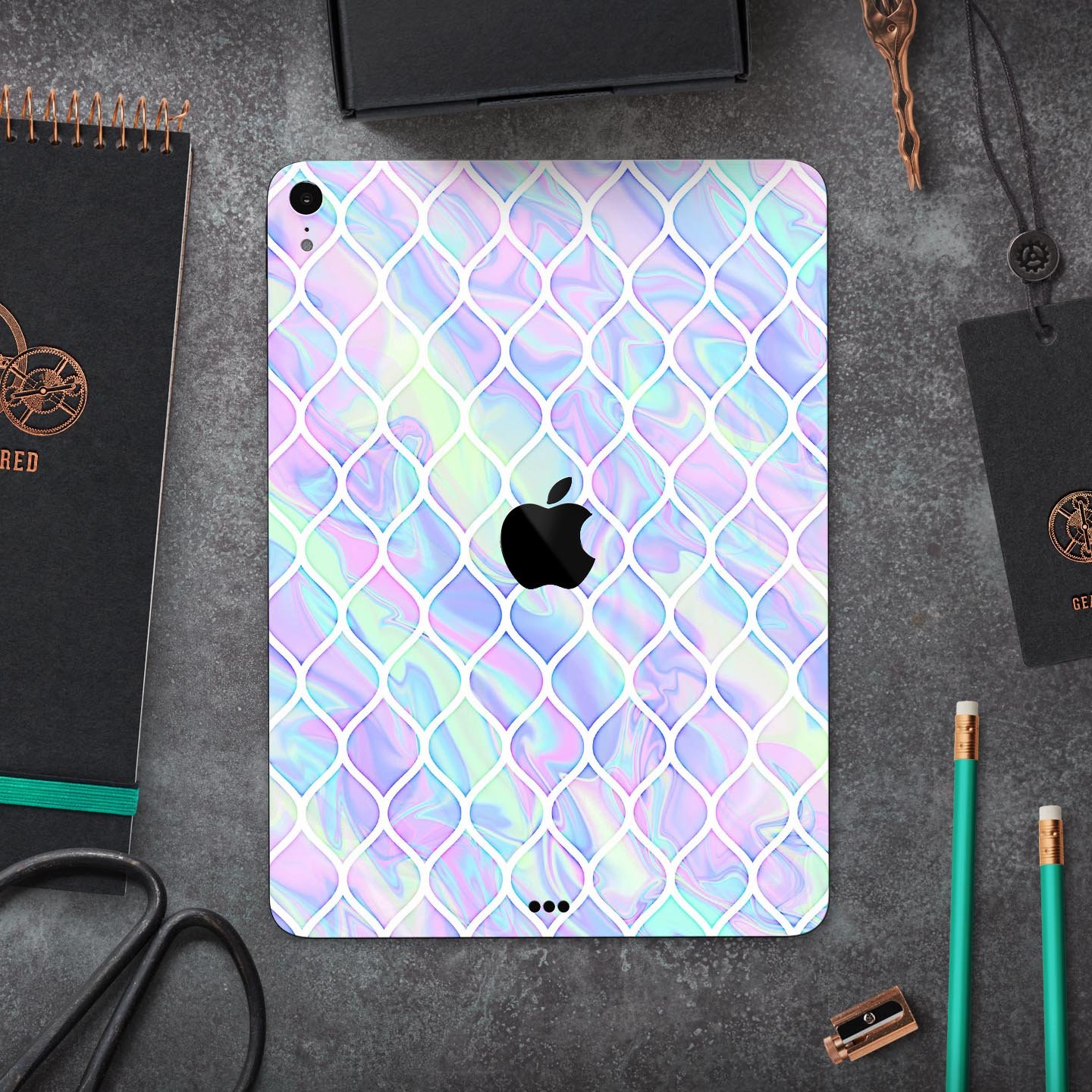 Iridescent Dahlia v4 skin decal for Apple iPad Pro, showcasing vibrant colors and a sleek design.