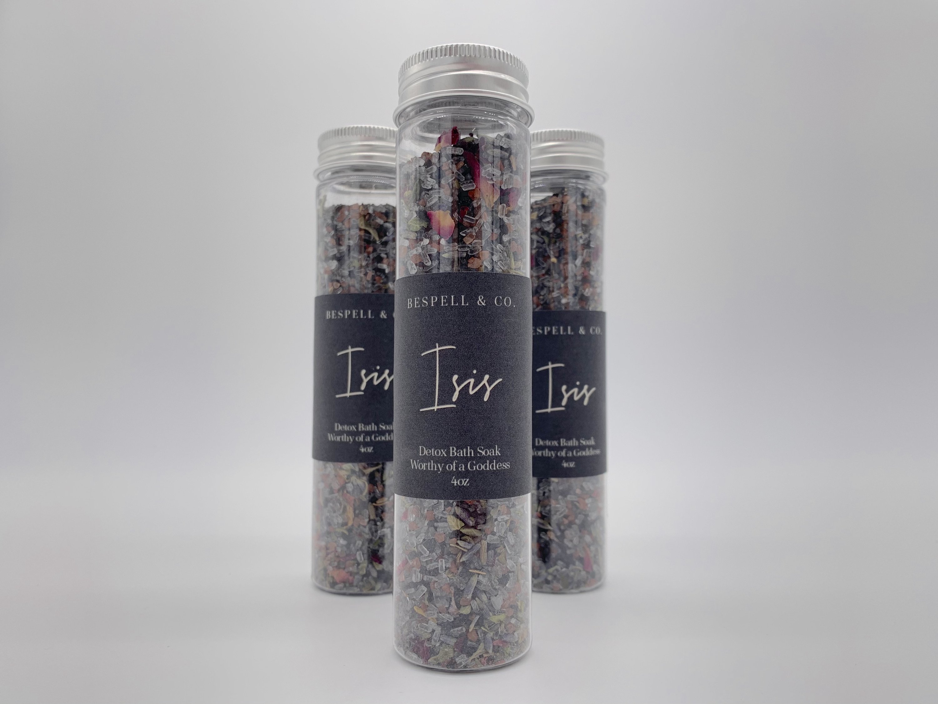 A luxurious bath soak featuring black salt, red salt, and an herbal blend, perfect for detoxifying and relaxing in the tub.