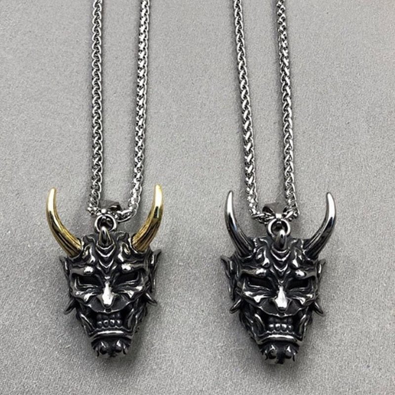 Japanese Ghost Skull Mask Necklace in gold and silver, featuring intricate skull design and alloy material.