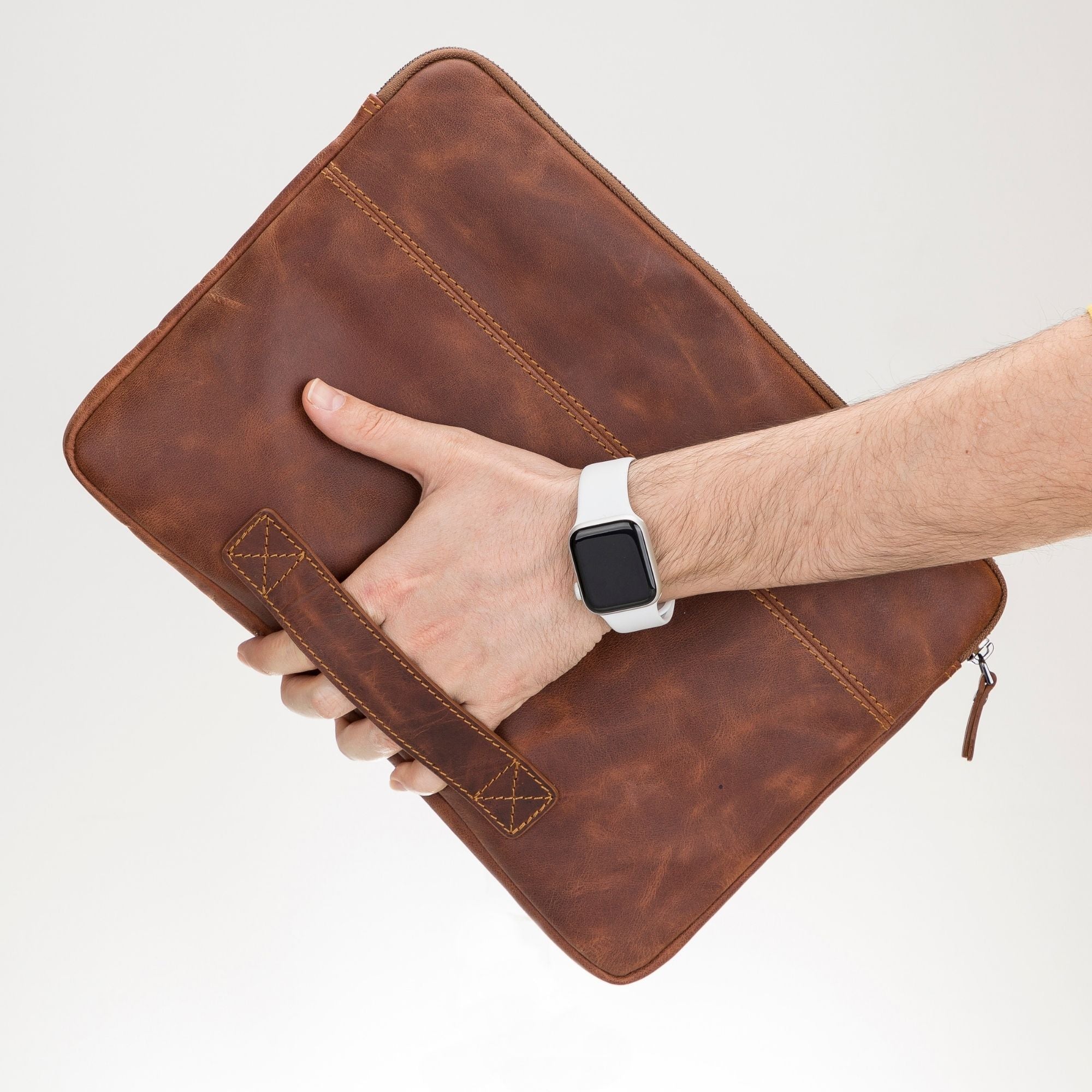 Kemmerer Leather Sleeve for iPad and MacBook, showcasing its genuine leather exterior and suede lining.