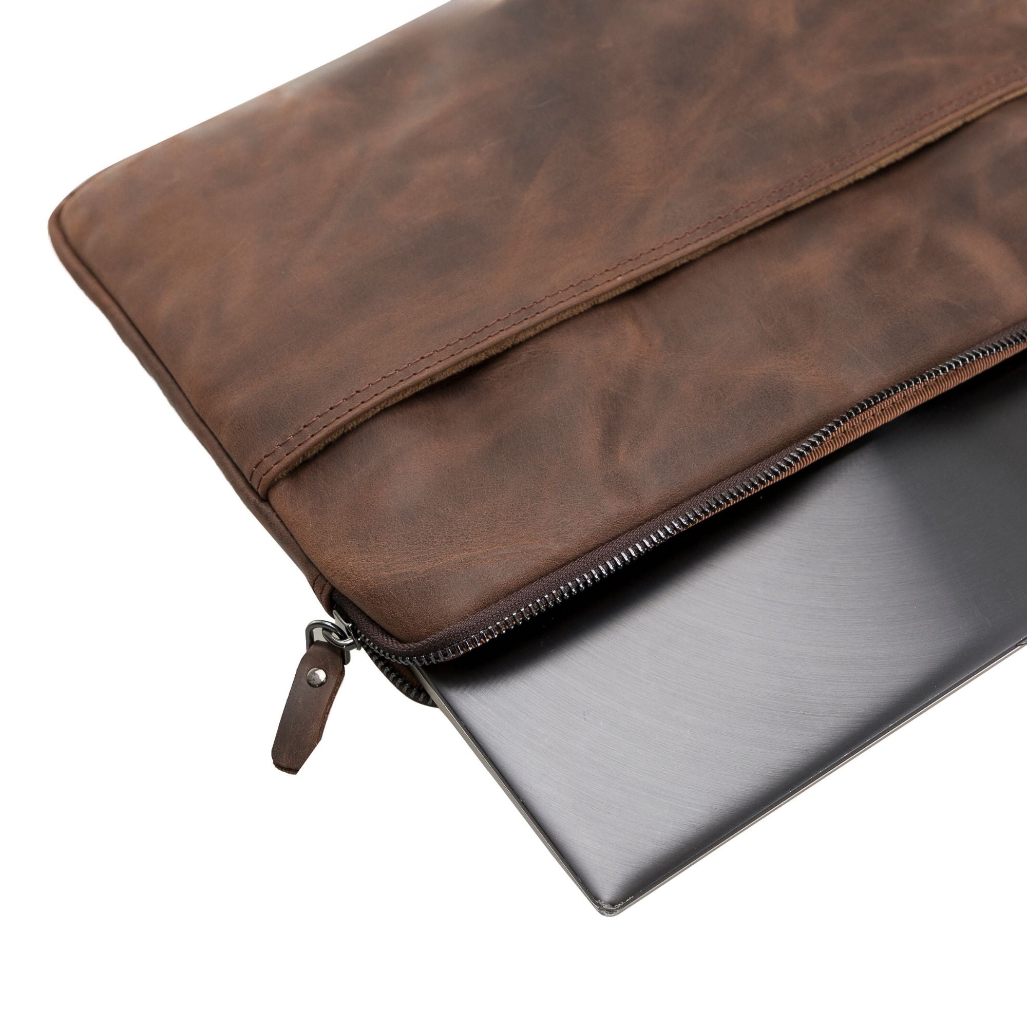 Kemmerer Leather Sleeve for iPad and MacBook, showcasing its genuine leather exterior and suede lining.