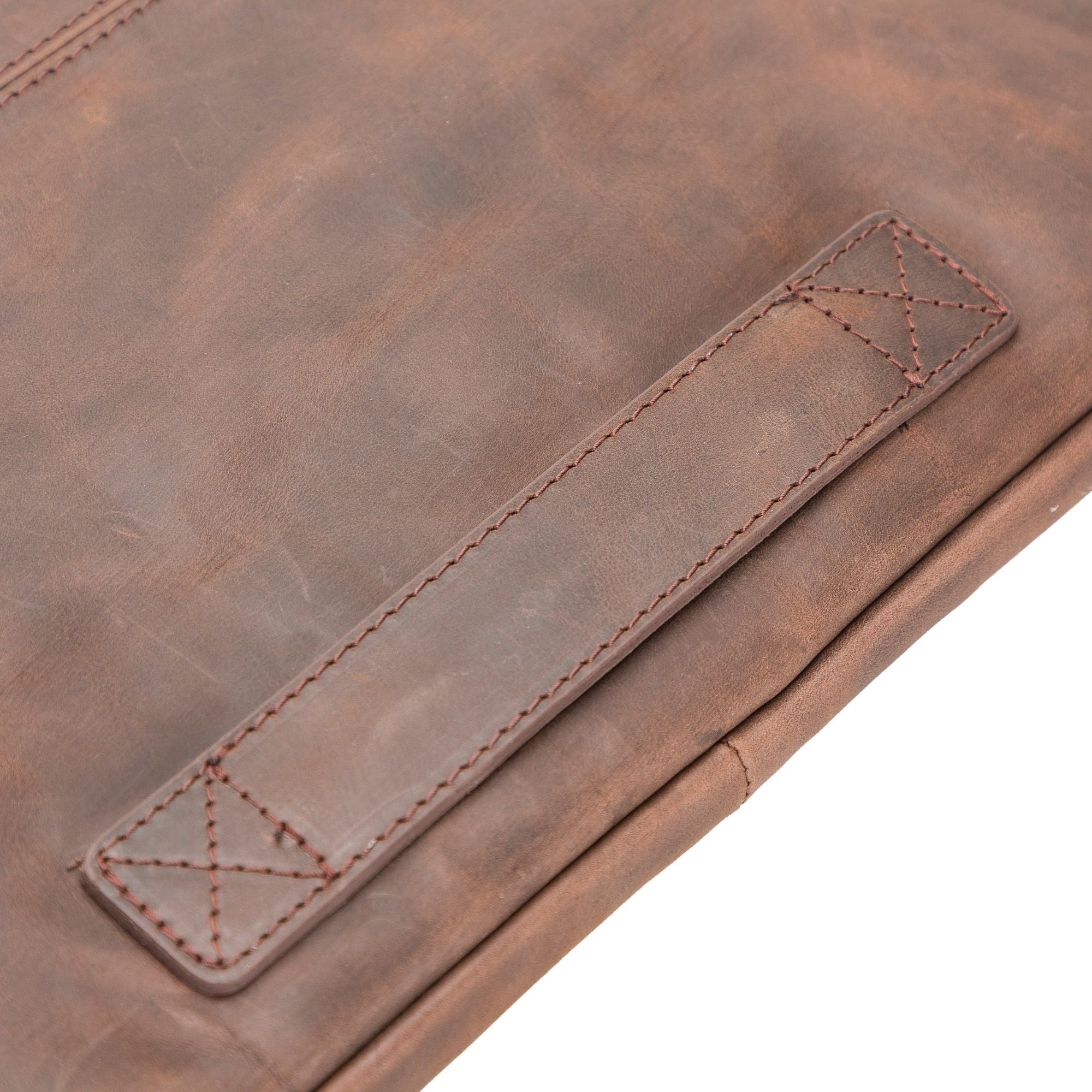 Kemmerer Leather Sleeve for iPad and MacBook, showcasing its genuine leather exterior and suede lining.