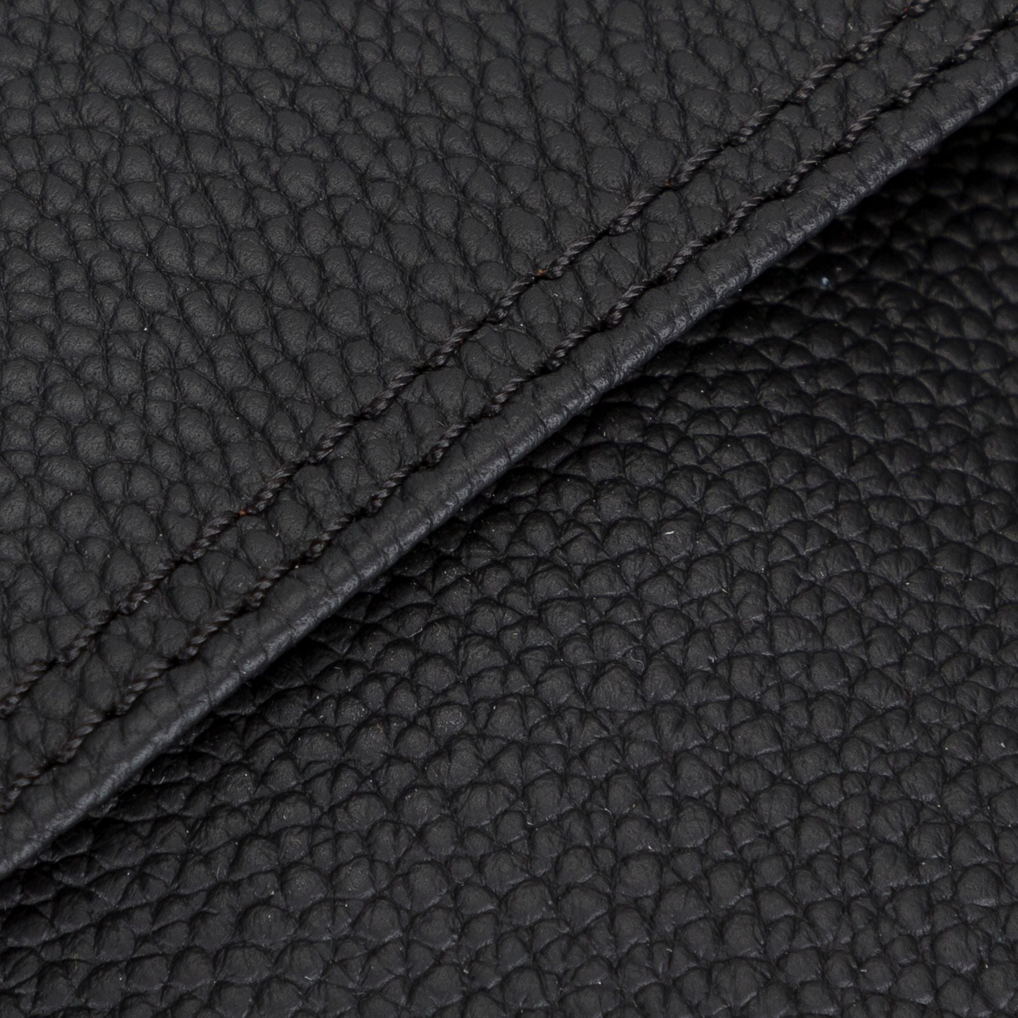 Kemmerer Leather Sleeve for iPad and MacBook, showcasing its genuine leather exterior and suede lining.