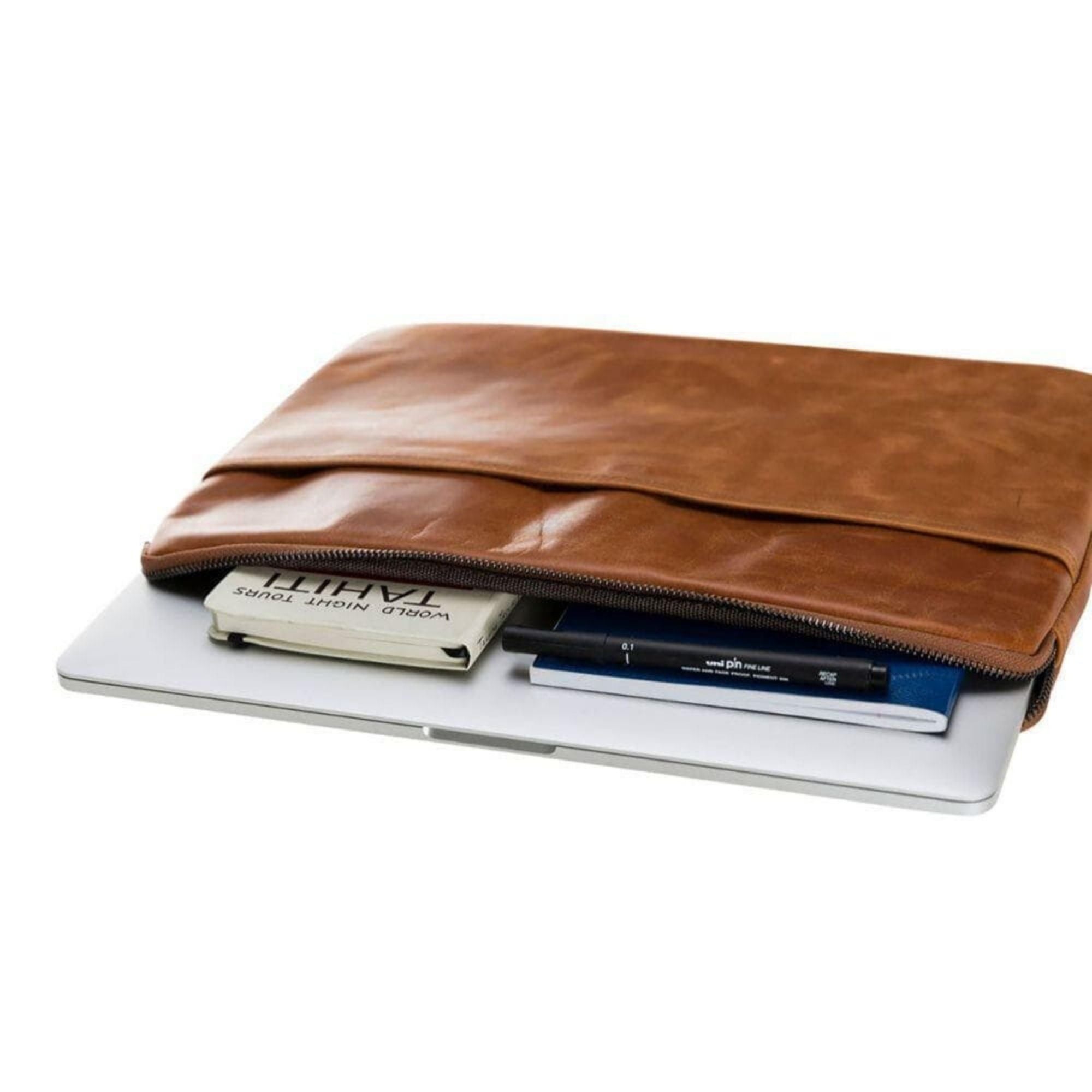 Kemmerer Leather Sleeve for iPad and MacBook, showcasing its genuine leather exterior and suede lining.