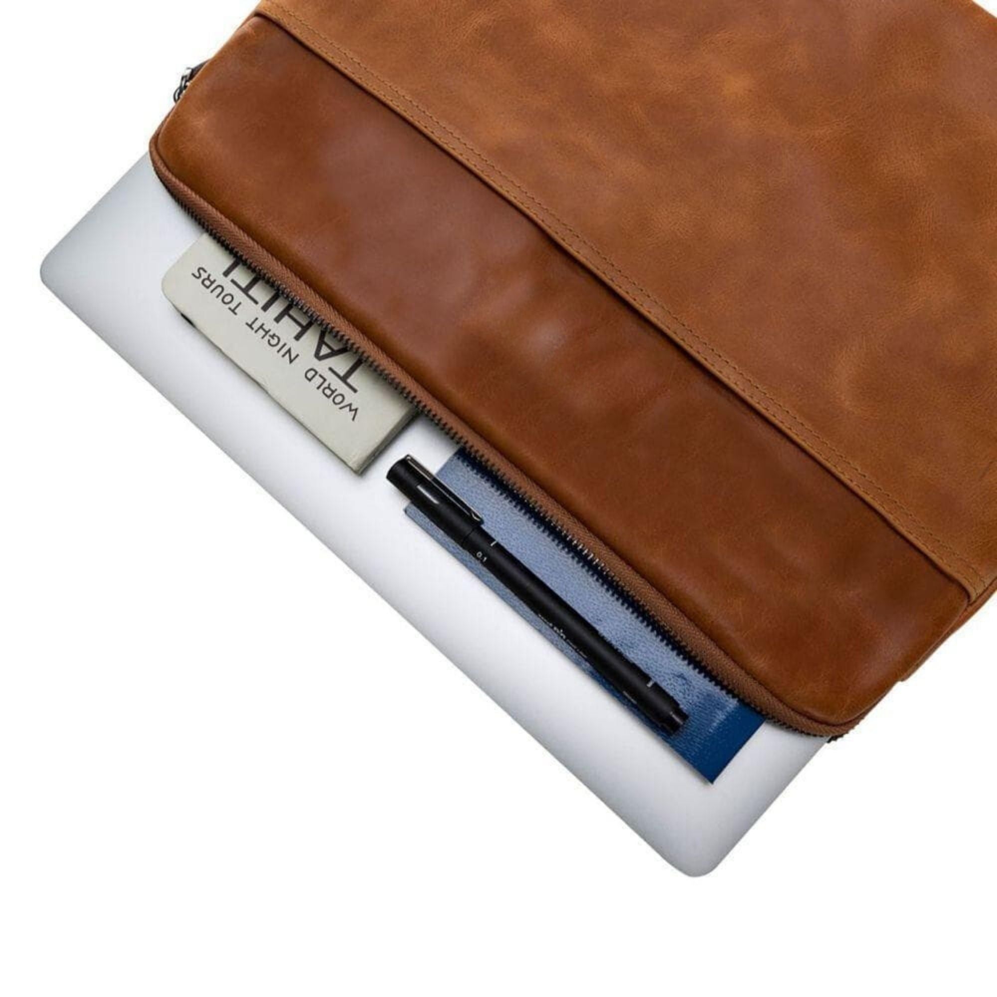 Kemmerer Leather Sleeve for iPad and MacBook, showcasing its genuine leather exterior and suede lining.