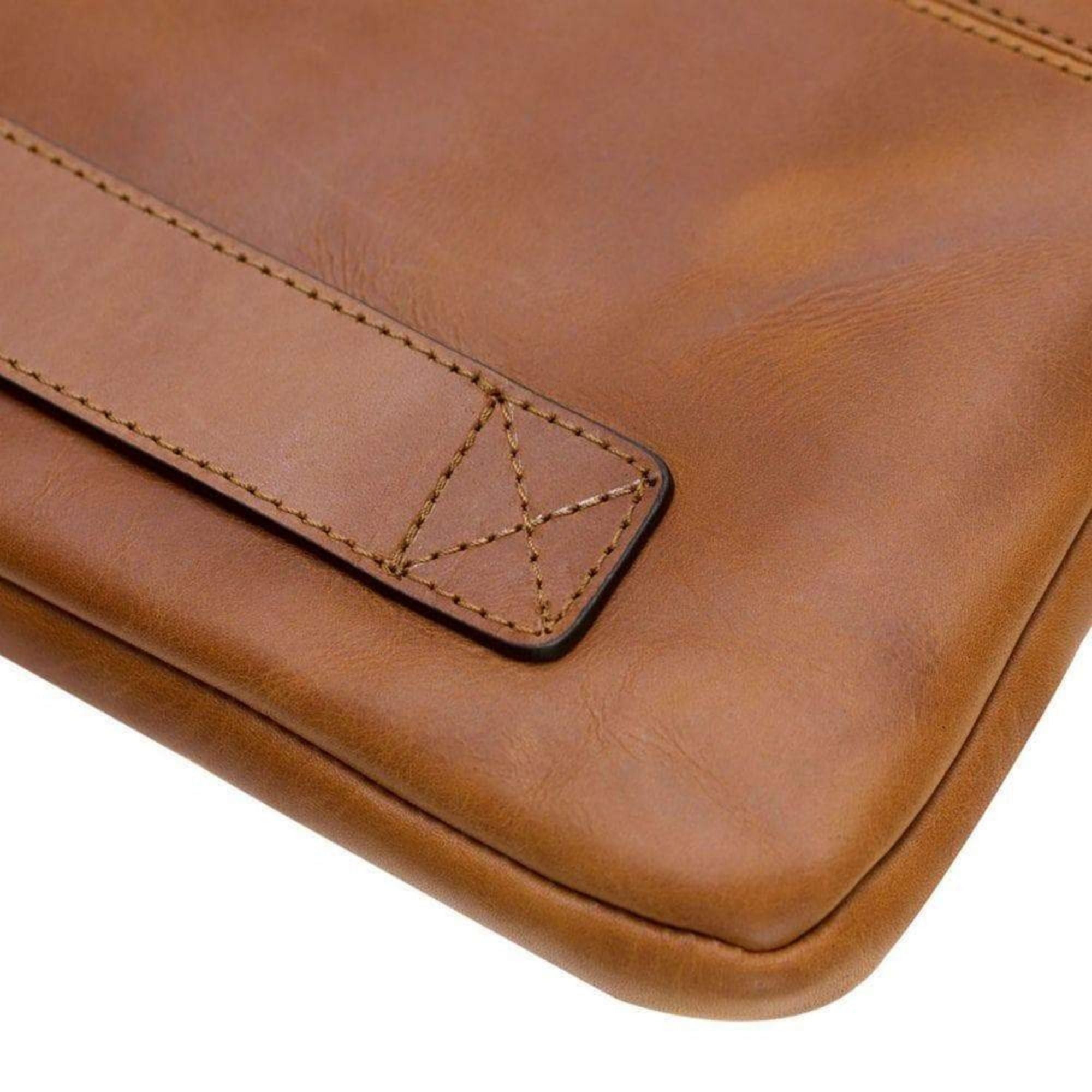 Kemmerer Leather Sleeve for iPad and MacBook, showcasing its genuine leather exterior and suede lining.